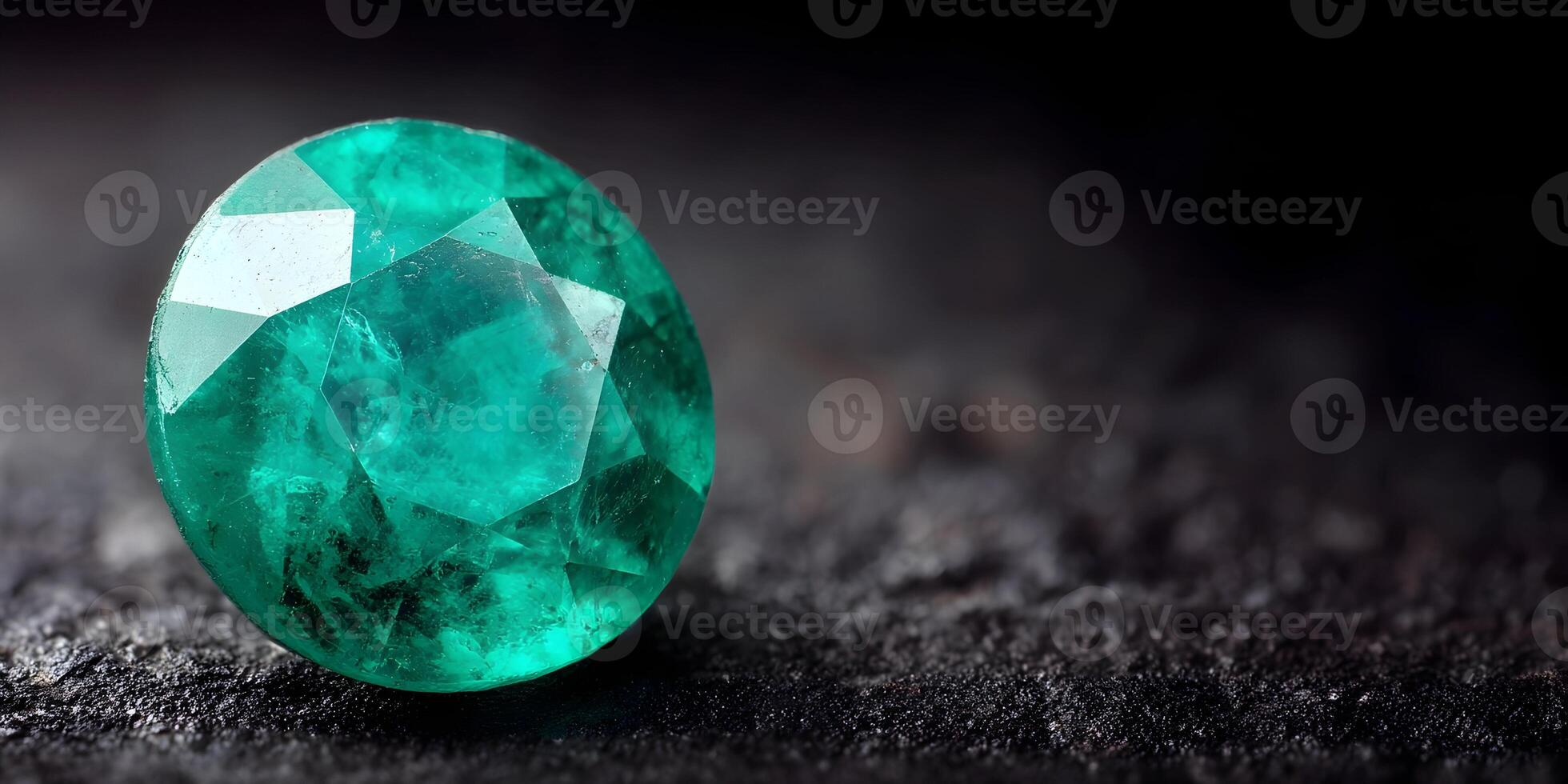 Oval Cut Emerald Gemstone on Dark Background Luxury Jewel Closeup photo