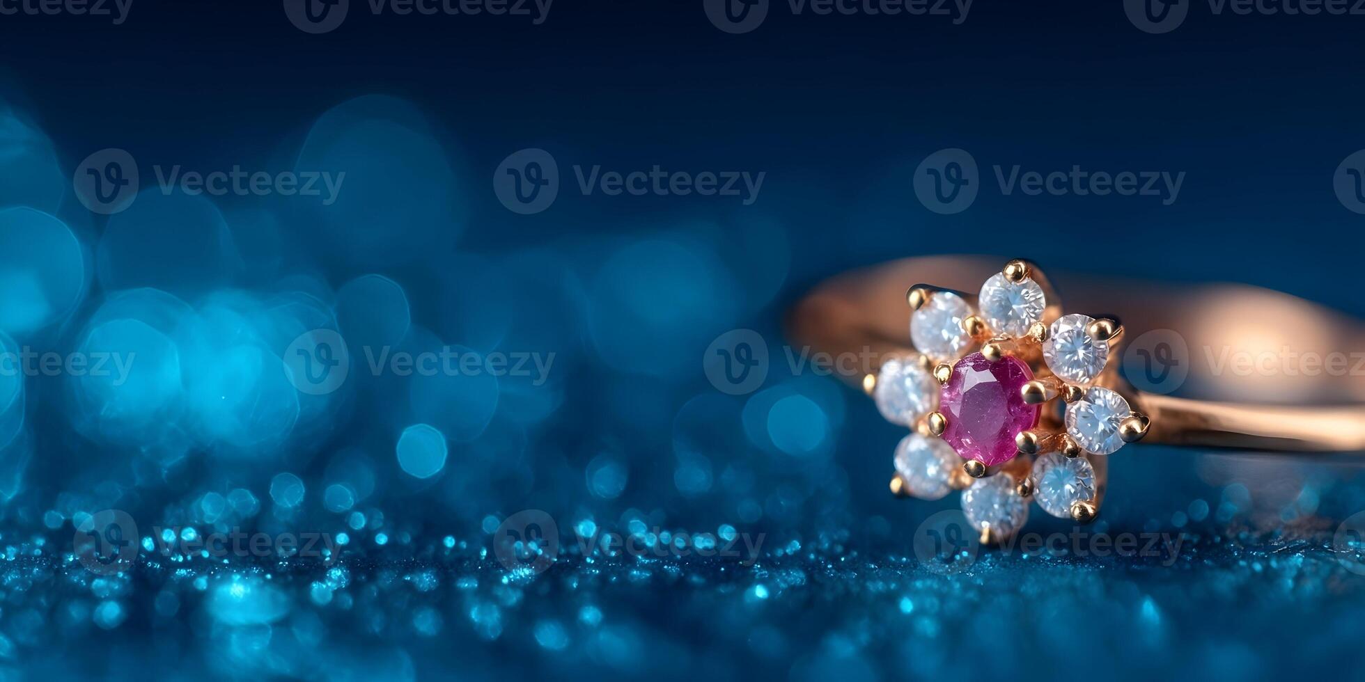 Gold Ring with Ruby and Diamonds on Blue Glitter Background photo