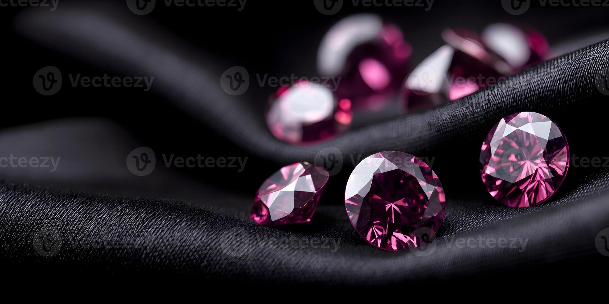 Closeup of Pink Gemstones on Black Silk Fabric Luxurious Jewelry Photography photo