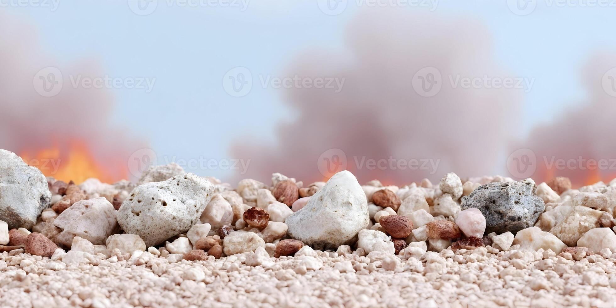 Rocks and Stones Pile with Blurred Fire and Smoke Background photo