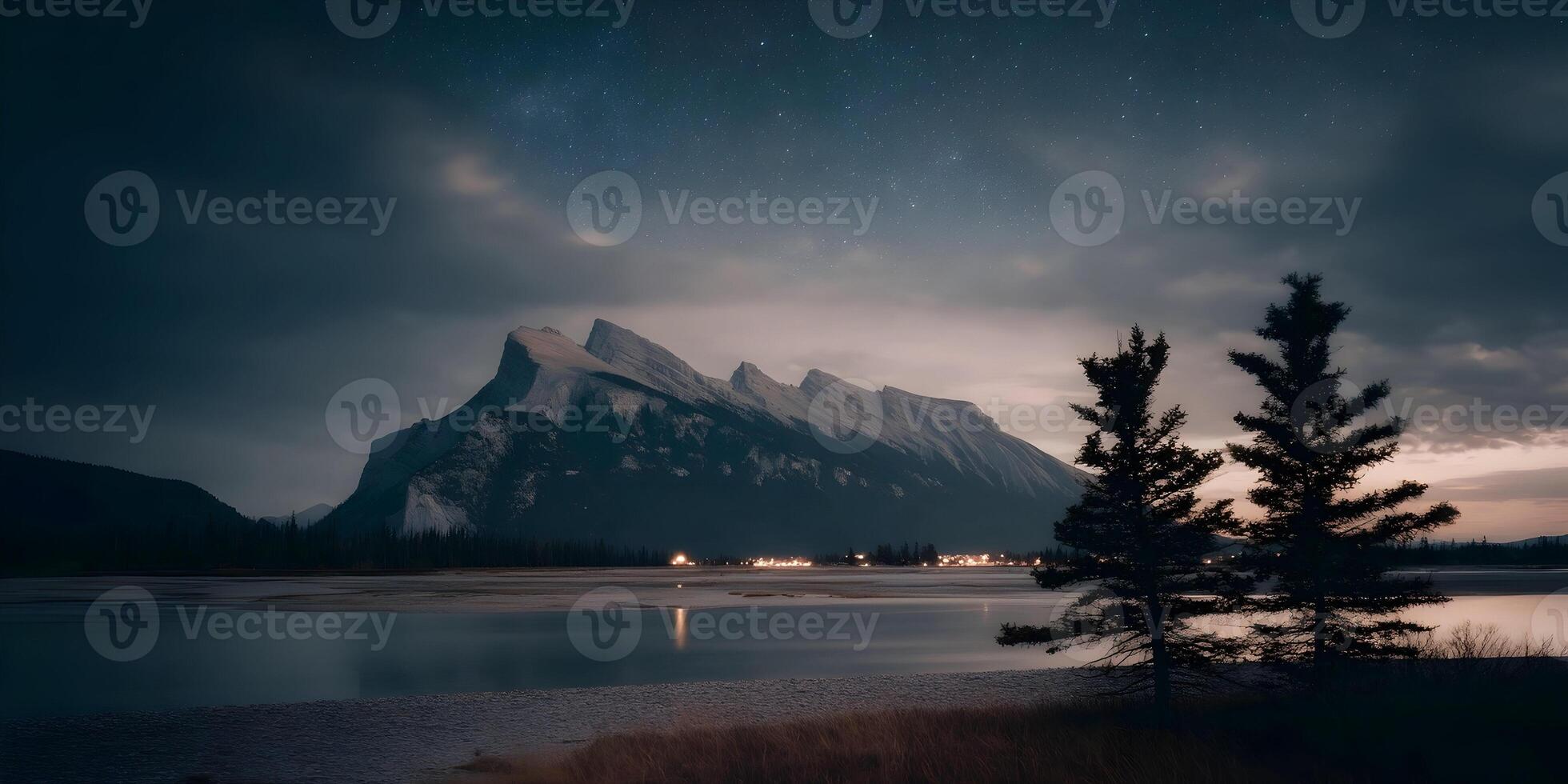 Night Landscape Mountain Range Stars Silhouetted Trees Calm Lake Lights photo