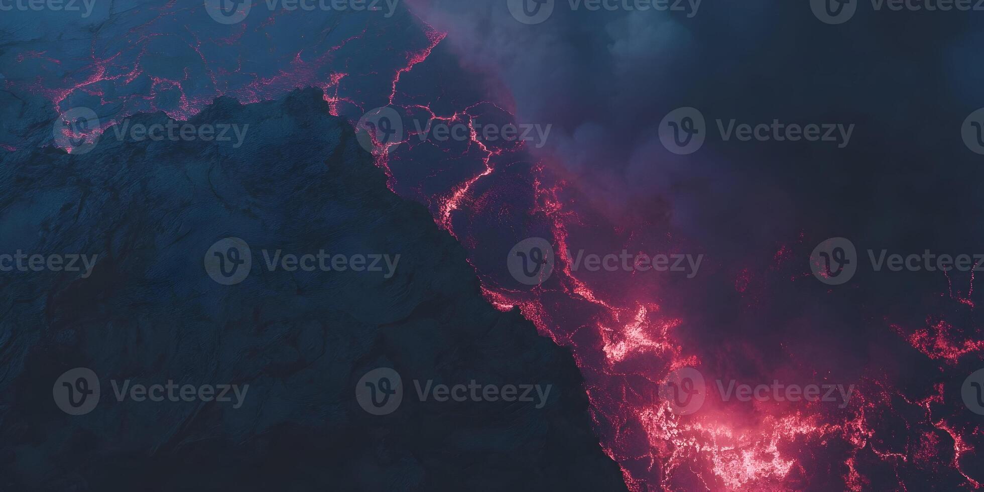 Aerial View of Red Hot Lava Flowing Down a Volcano at Night Dark Volcanic Rock Surface Texture photo