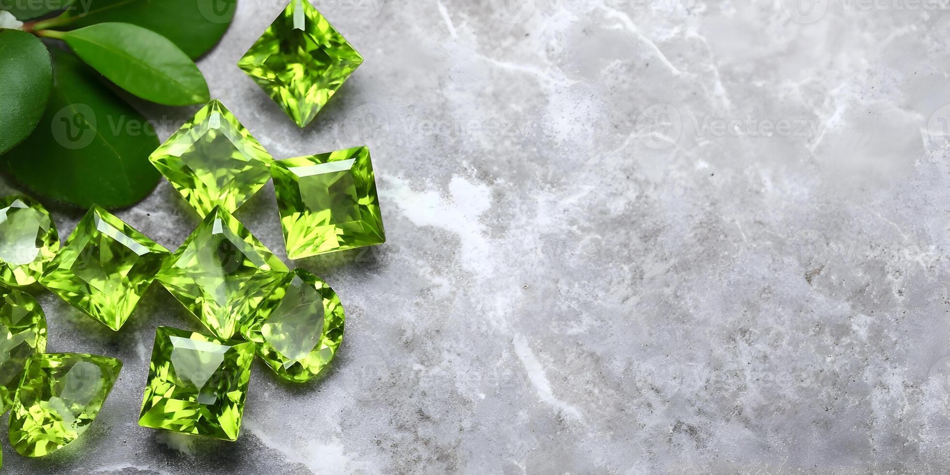 Green Peridot Gemstones on Marble Surface with Leaves photo