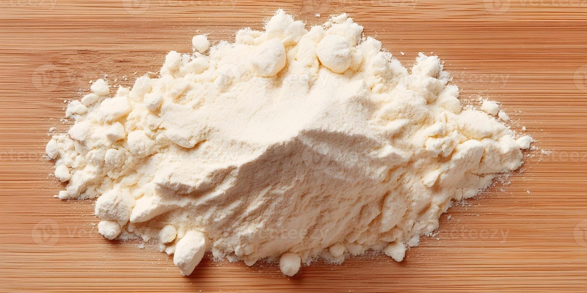 Pile of White Powder on Wooden Background Food Ingredient Baking Flour photo