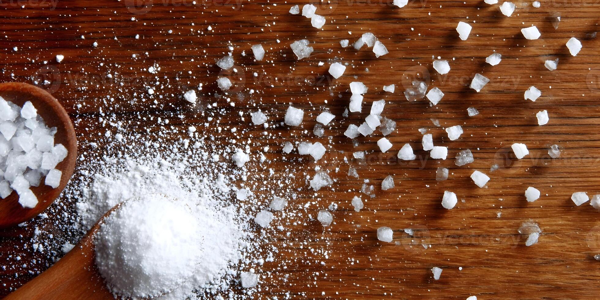 Coarse Sea Salt and Fine Salt on Wooden Tabletop photo