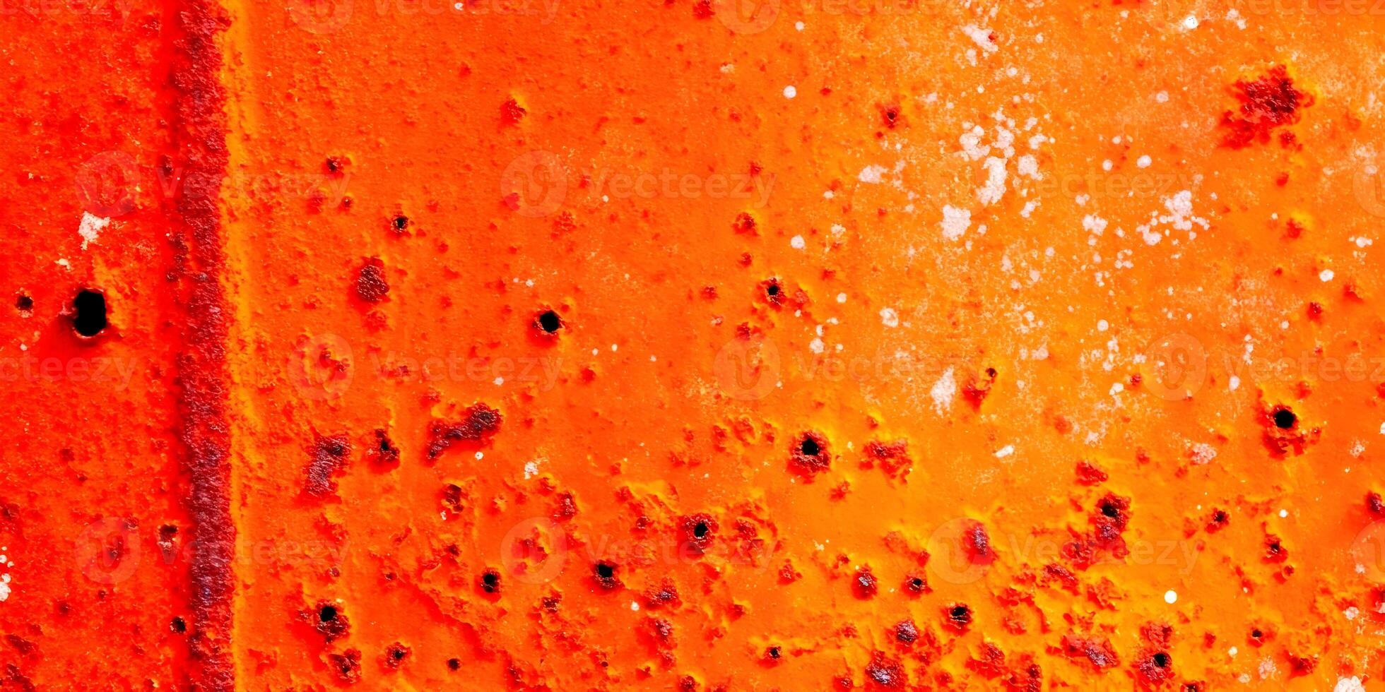 Highly Detailed Rust Texture Orange Metal Surface with Holes and Corrosion Spots photo