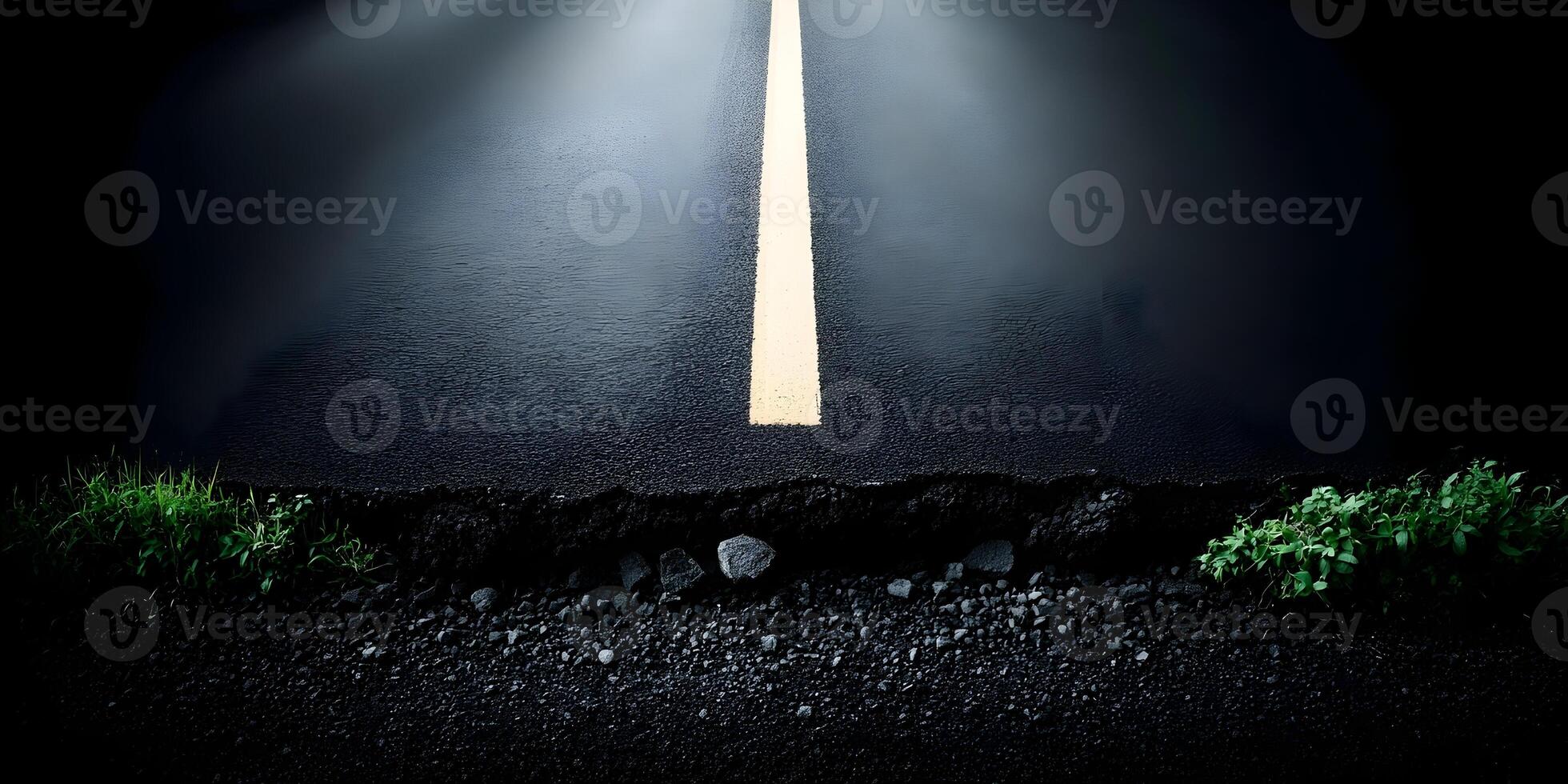 Dark Asphalt Road with Yellow Line Crack and Green Plants photo