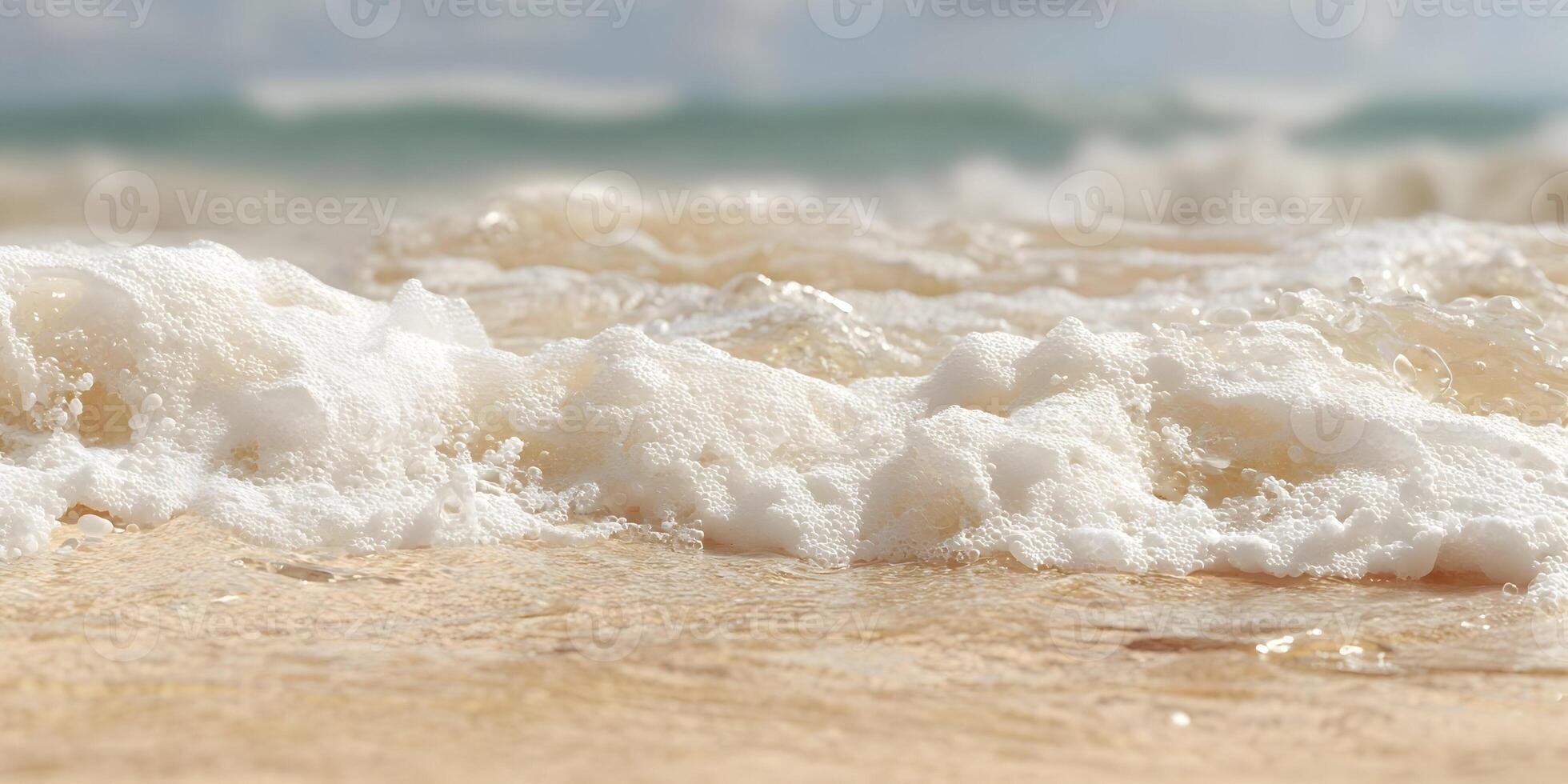 Ocean Waves Crashing on Sandy Beach Closeup White Foam Bubbles Sea Water Texture photo