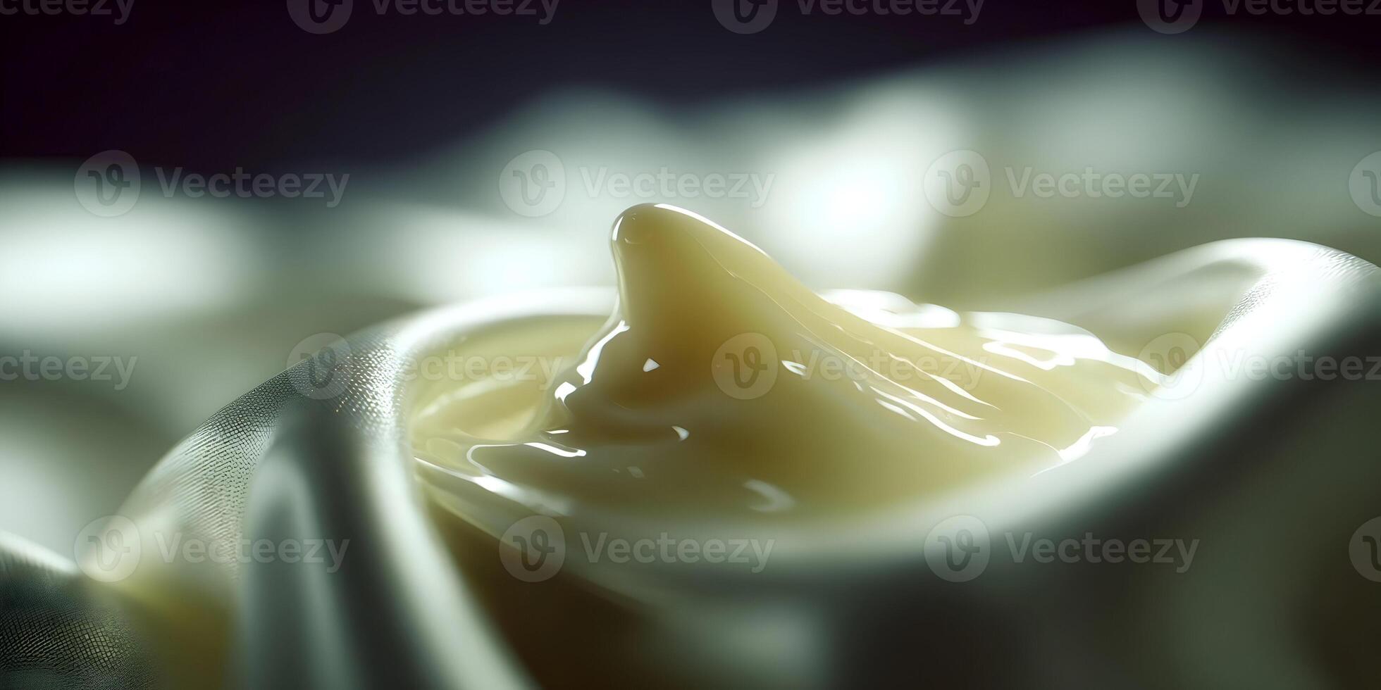 Creamy Liquid Texture on White Silk Fabric Closeup photo