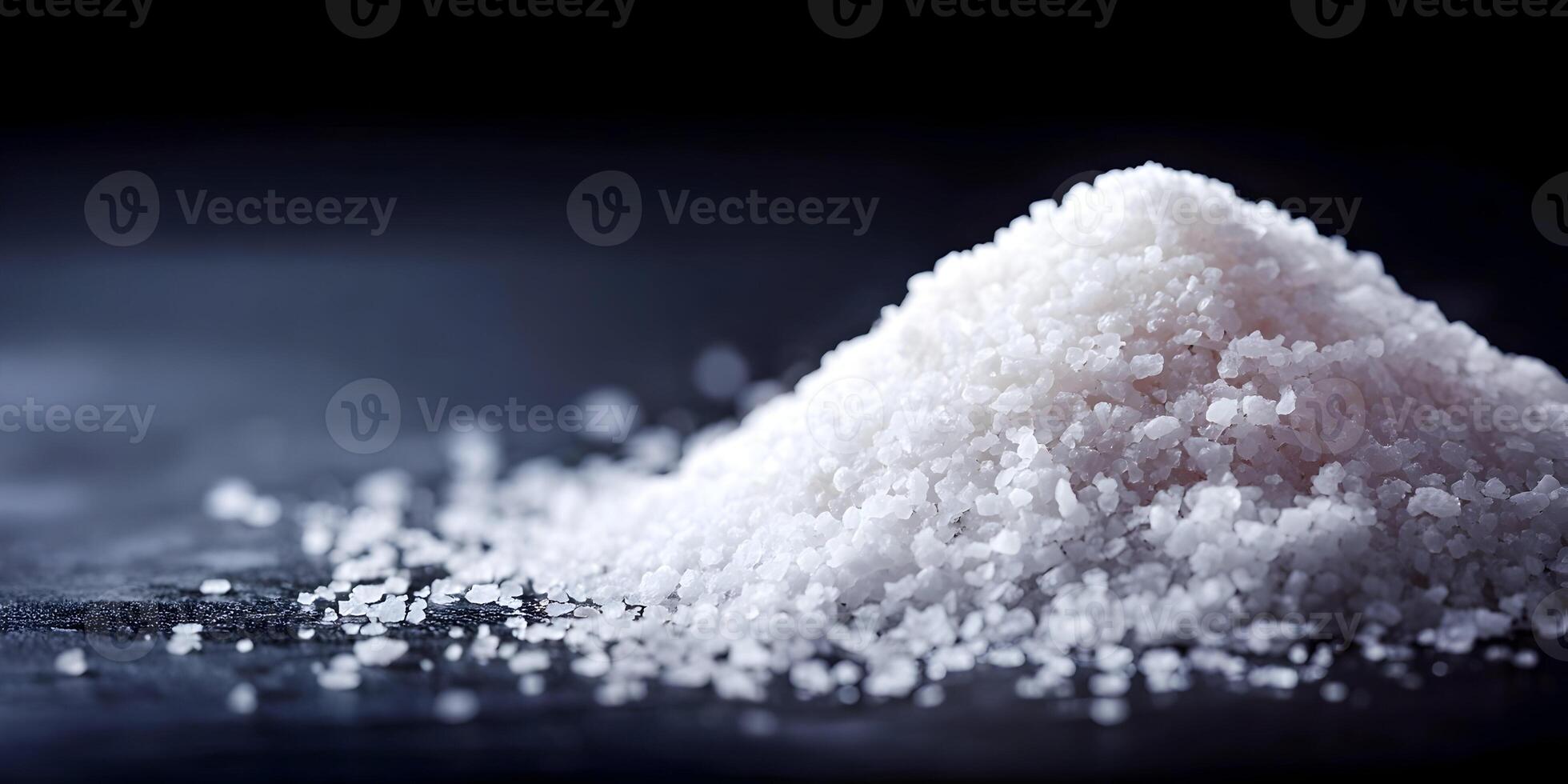 Closeup Pile of White Sea Salt Crystals on Dark Background Food Photography photo