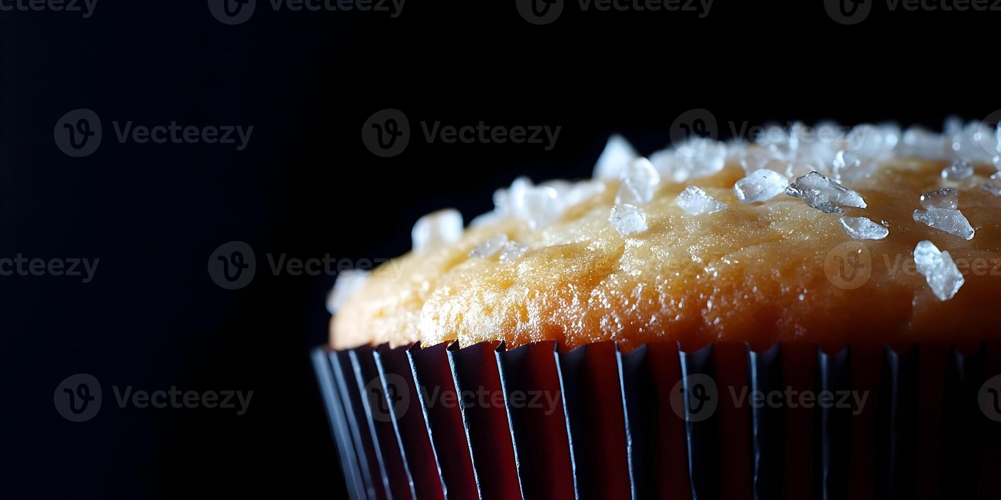 Closeup of Salted Caramel Cupcake in Dark Setting photo