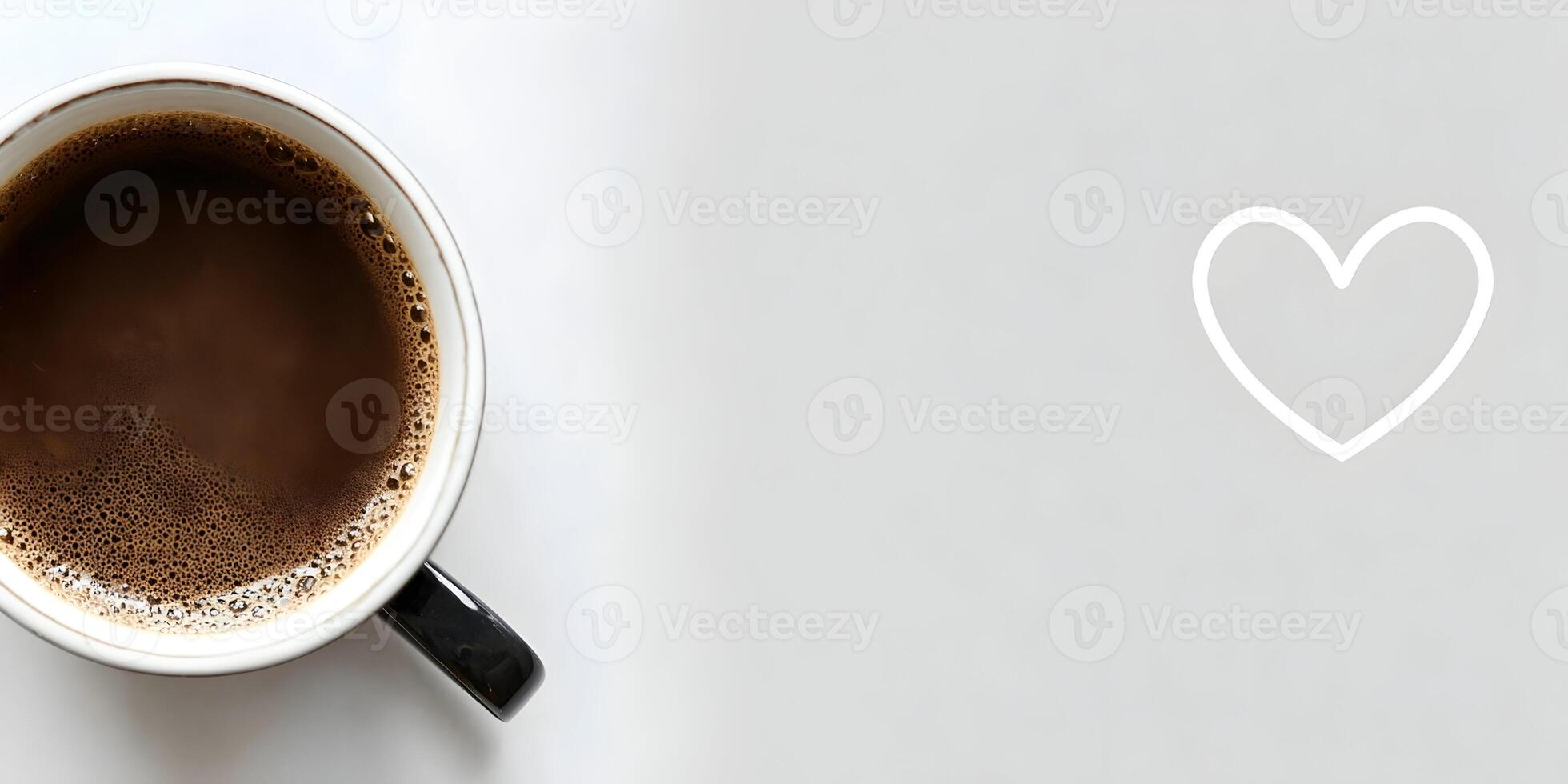 Black Coffee Cup with Heart Shaped Drawing on White Background photo