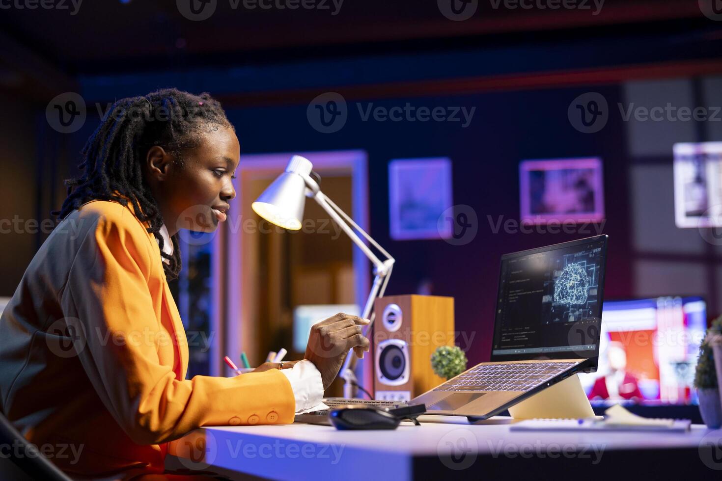 Developer writing code on laptop and doing maintenance on artificial intelligence neural networks computerized model. Tech support expert typing on keyboard, doing checkup on AI systems in home office photo