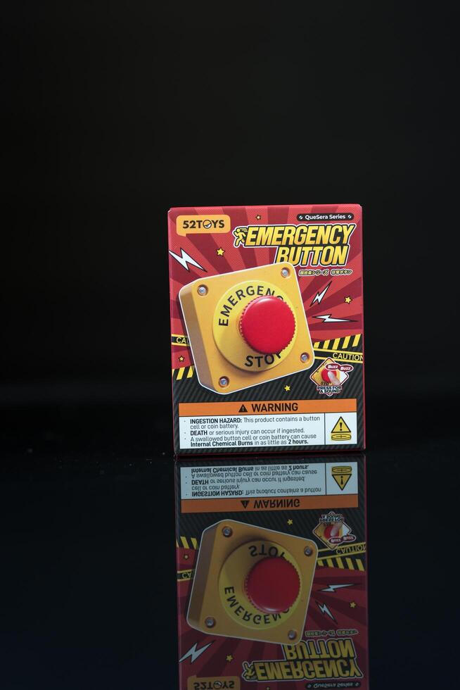 Bangkok, Thailand - June 27, 2025 A box toy from 52TOYS QUESERA Series-Emergency Button Series Blind Box Figure Toy photo
