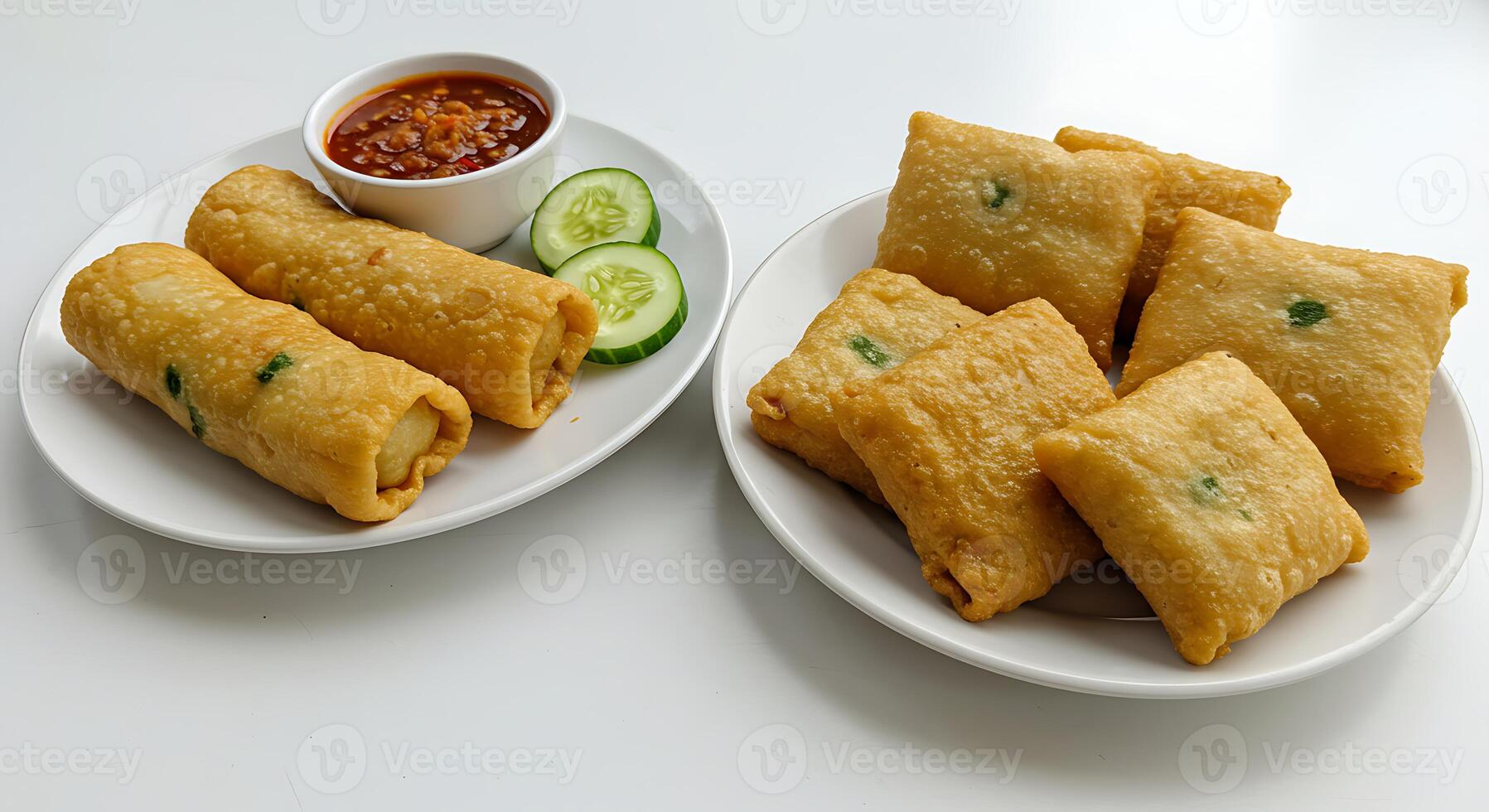 Delicious Fried Food on Plates with Sauce and Vegetables Ready for Serving photo