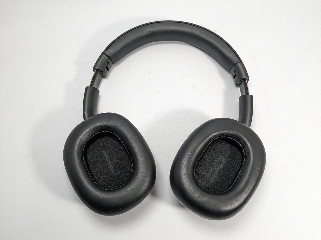 Overhead Studio Shot of Black Over-Ear Headphones Isolated on a White Background photo