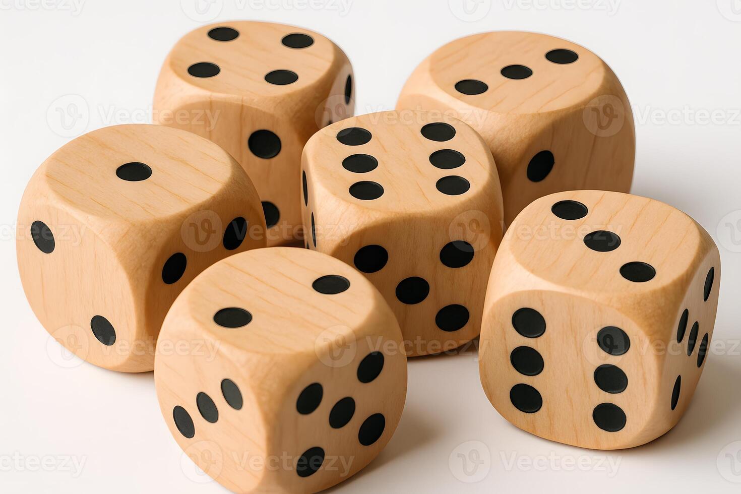 Wooden dice with black dots on them photo