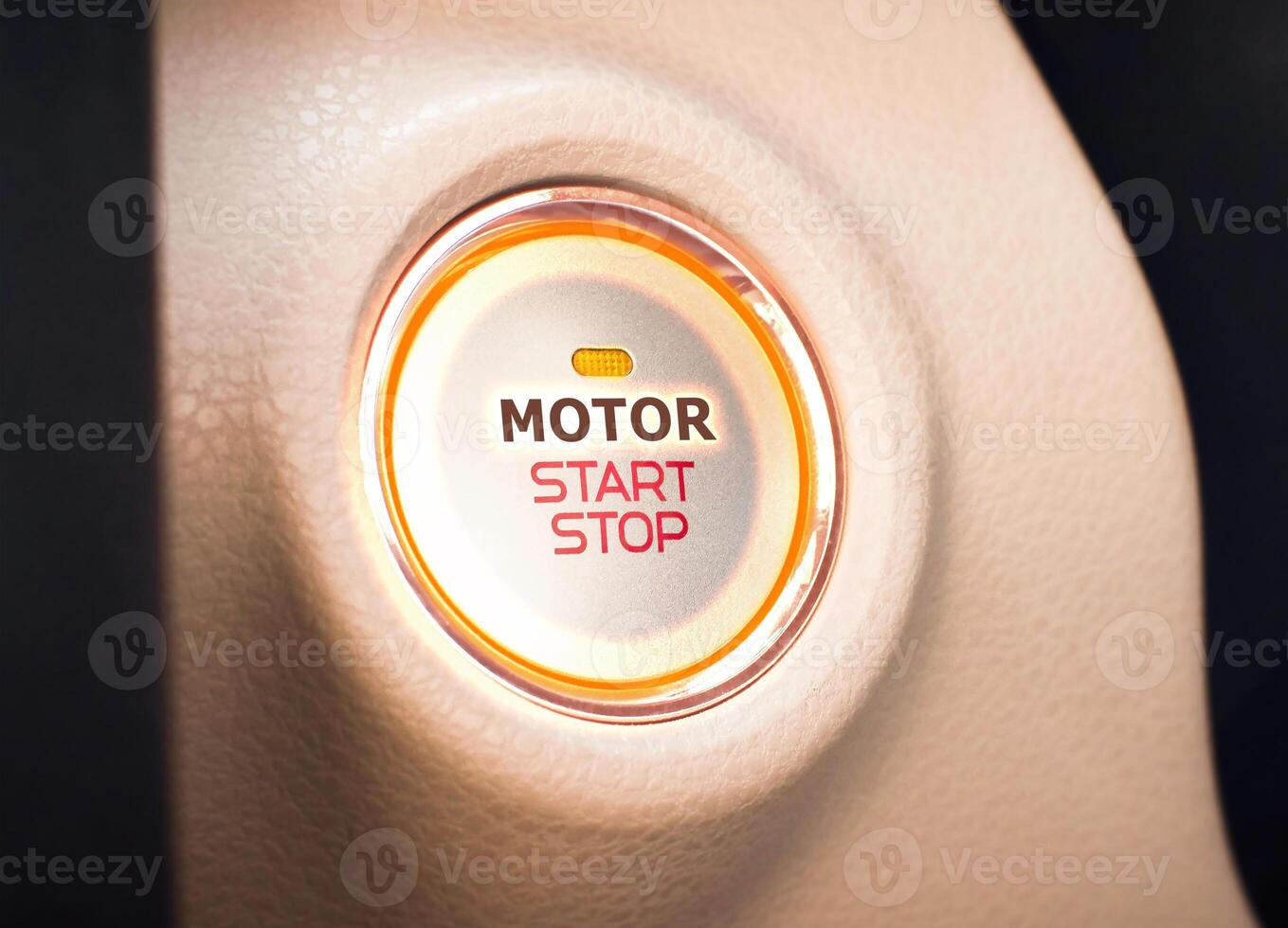 Car start button, MOTOR START STOP switch or Push start with keyless ignition, modern car or electric vehicle concept. photo