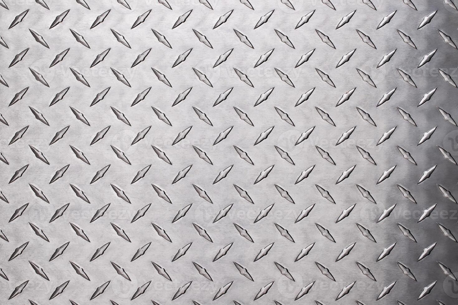 texture stainless steel with diamond pattern. light metal floor or wall background photo