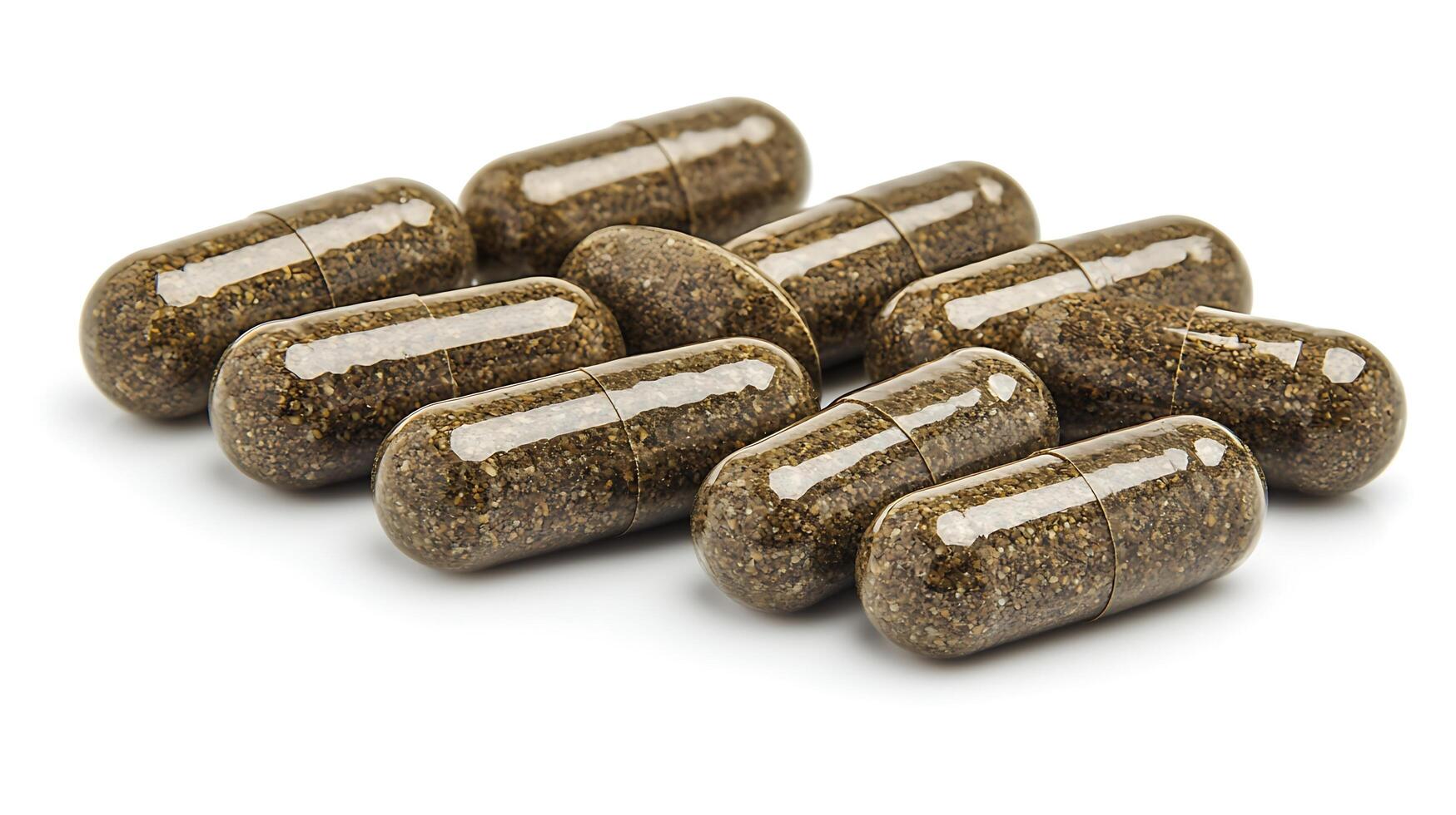 A cluster of natural herbal supplement capsules on a clean white background. These clear capsules reveal the granular contents, suggesting organic ingredients and wellness. photo