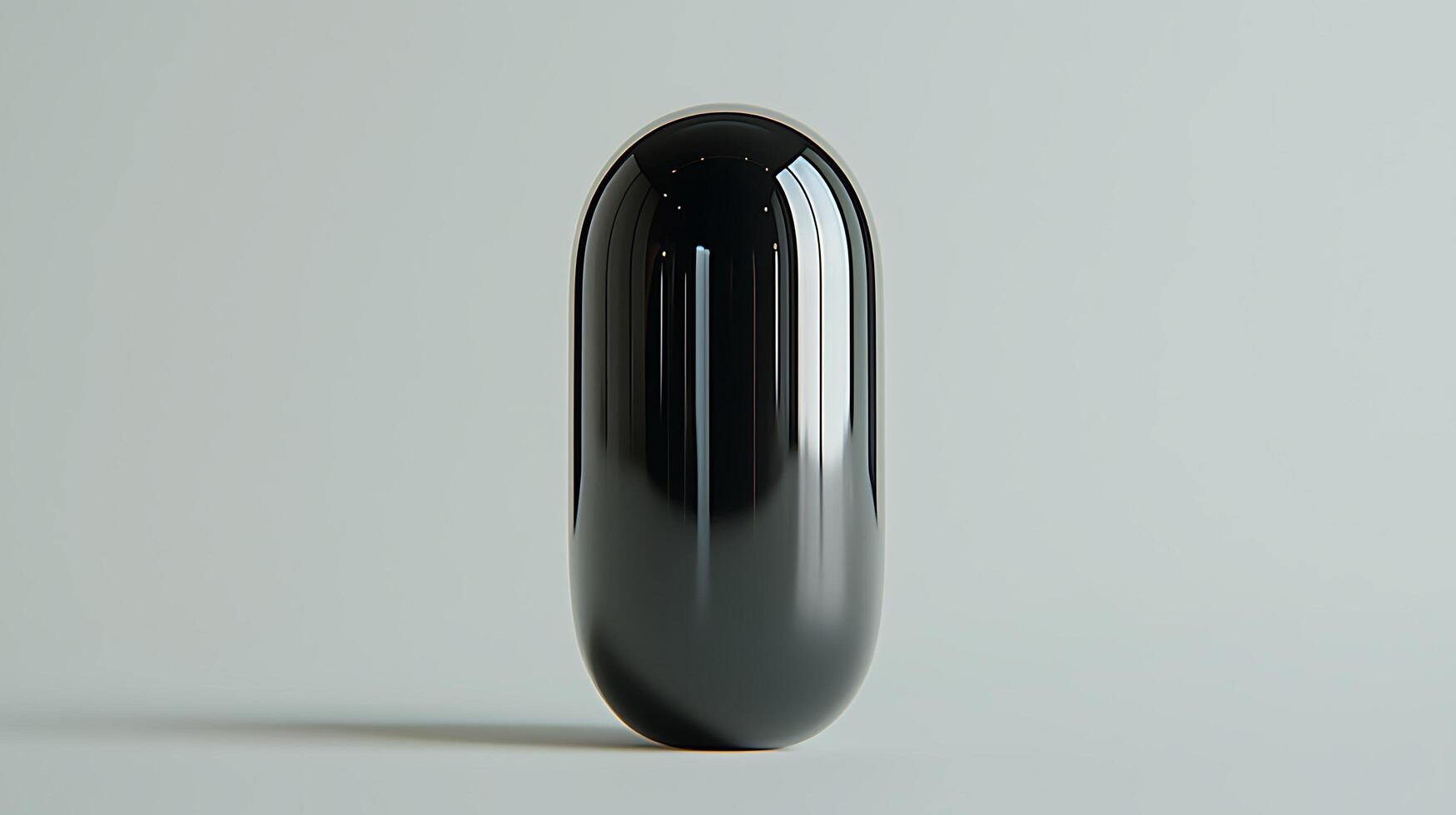 A single, sleek, black capsule stands upright against a light gray background, reflecting subtle highlights. photo
