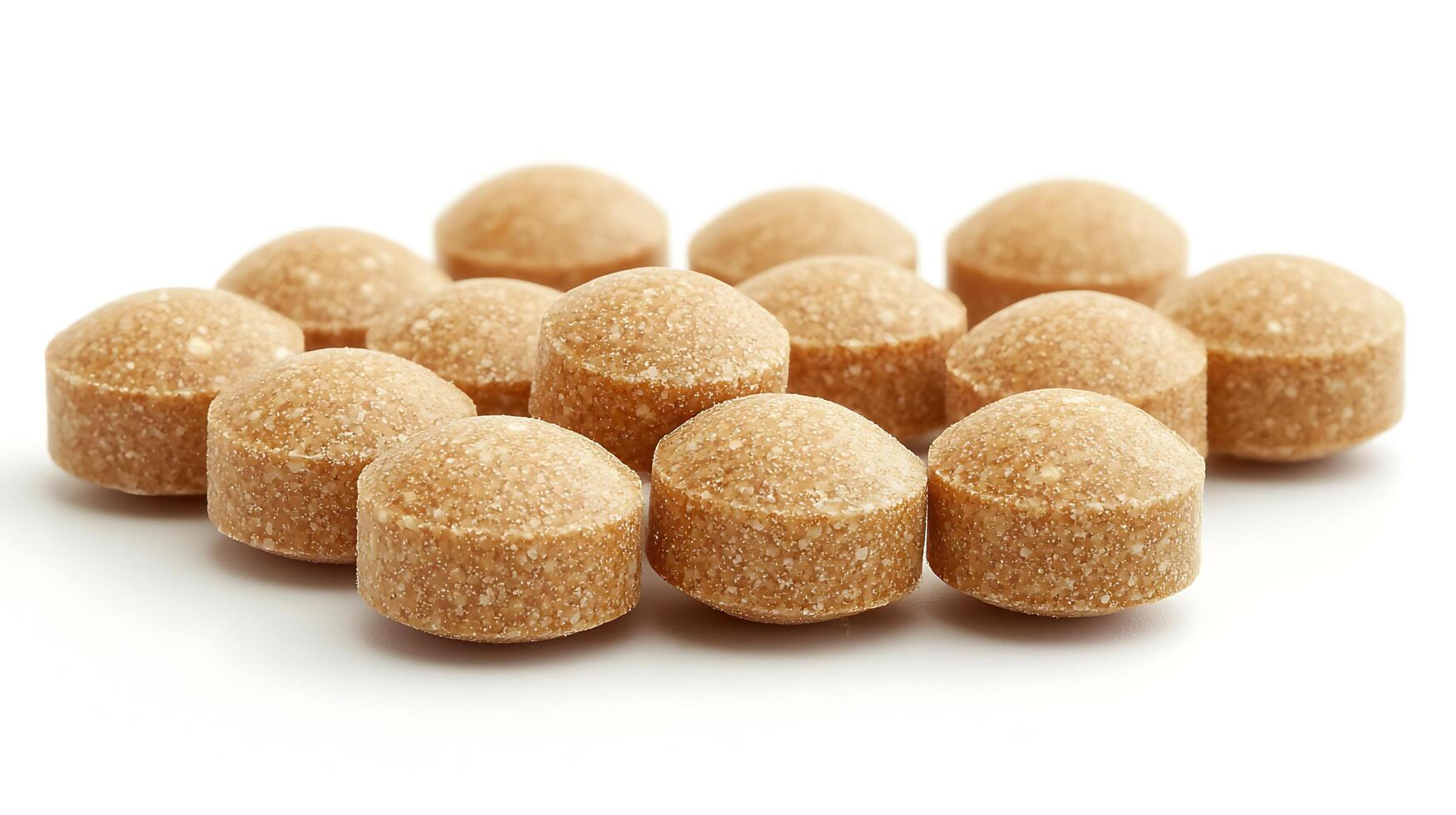 A Pile of Circular Brown Sweets. photo