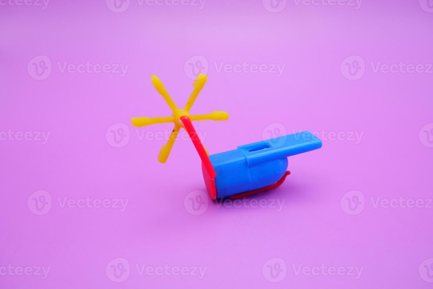 Vintage-Inspired Whistle Toy on Vibrant Background photo