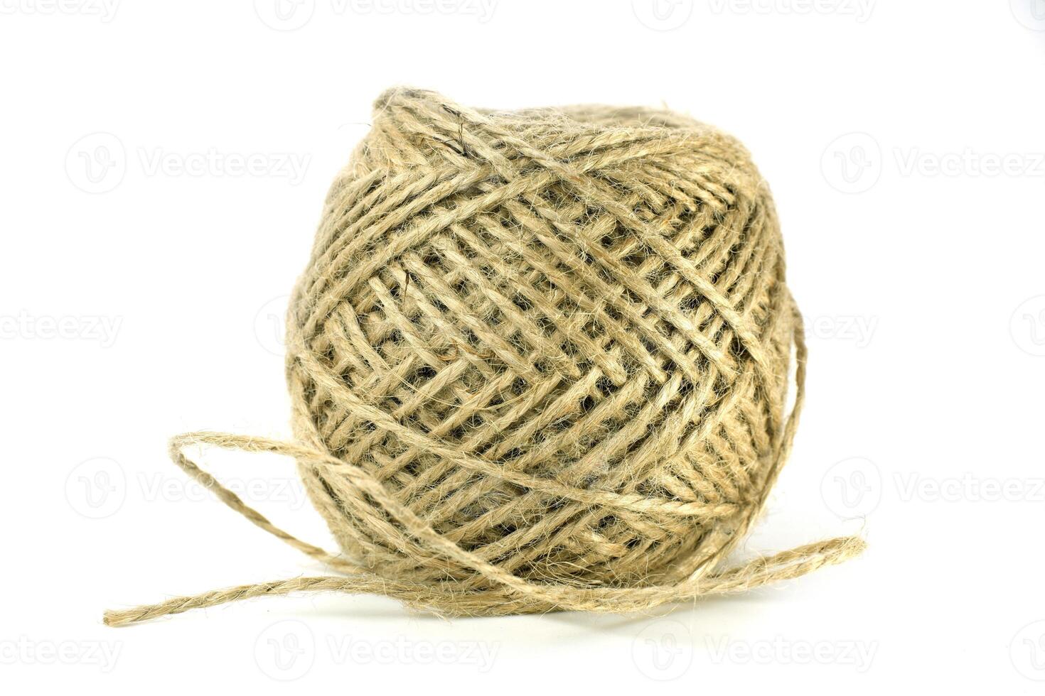 A skein of thread, twine for tying packaging. A ball of twine on a white background. photo