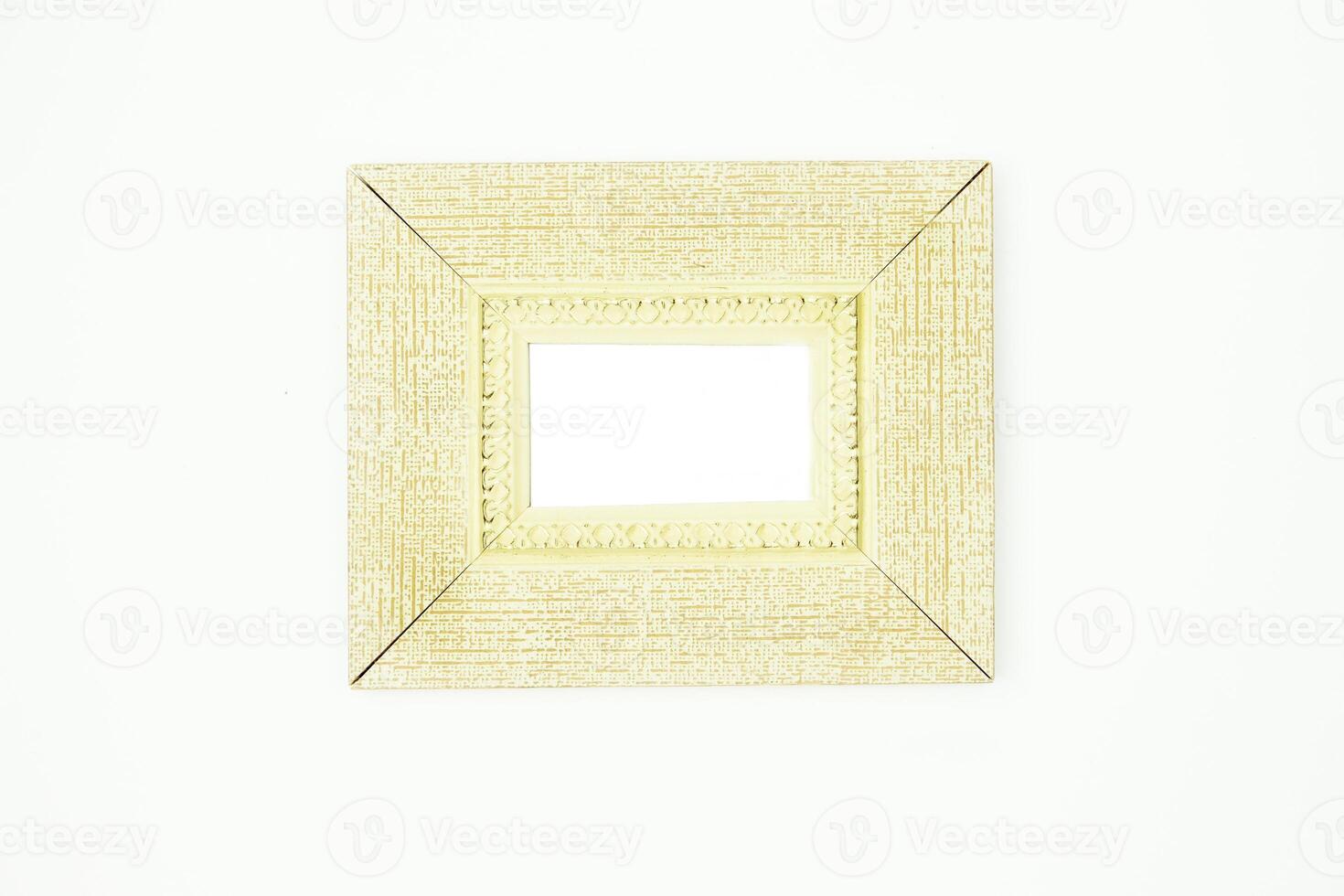 The frame is light, silver, the frame is white with gold edging on a white background. photo