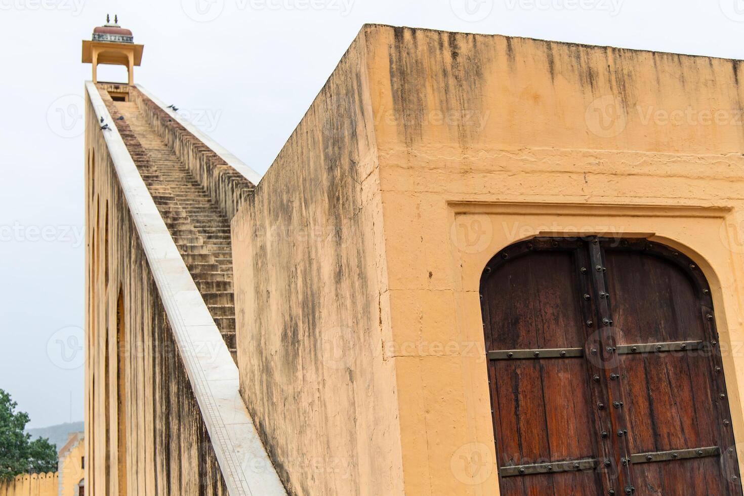 Jantar Mantar giant sundial with stairs reaching the sky in Jaipur photo