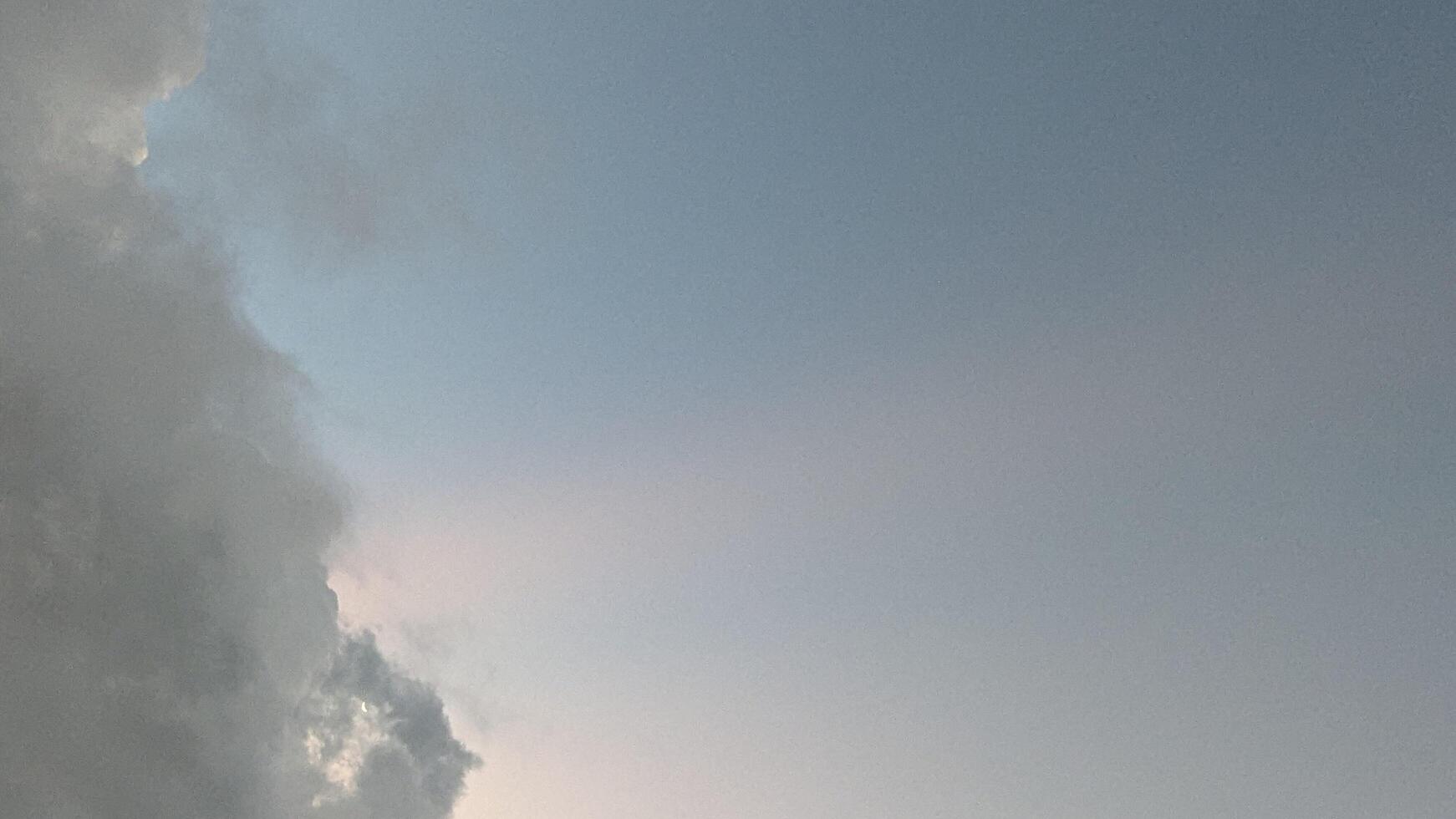 Dramatic Sky with Grey Clouds Edge and Blue Sky Backdrop, Peaceful Atmosphere photo
