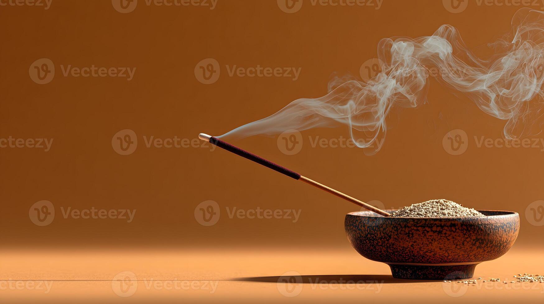 Burning Incense With Smoke Trail On Warm Cream Background photo