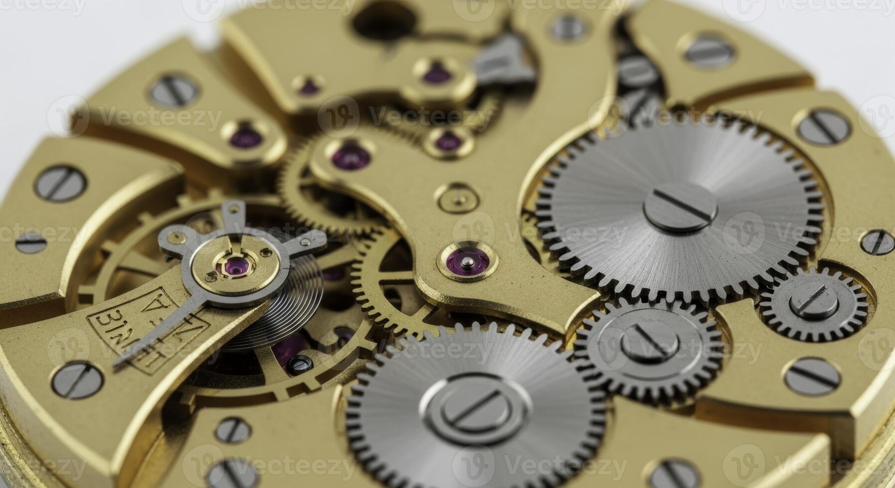 Macro view of intricate golden gears and ruby jewels inside a vintage mechanical watch movement photo