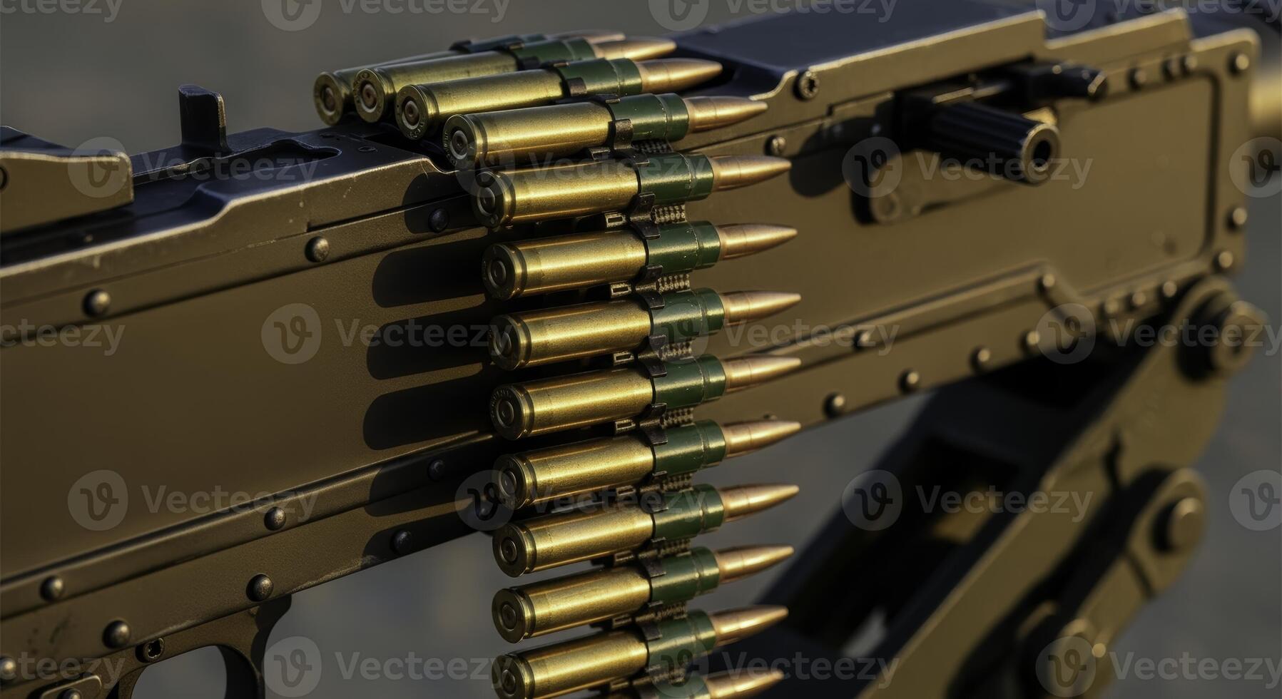 Detailed close up of a heavy machine gun with a loaded ammunition belt and bullets photo
