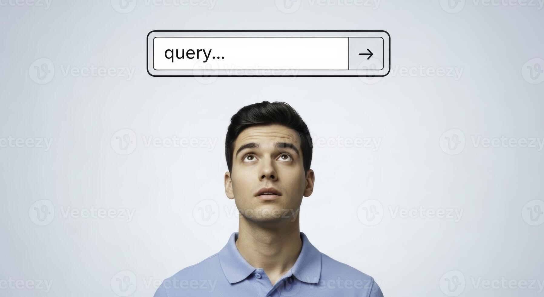 Young man looking up at a search bar with query text for information photo