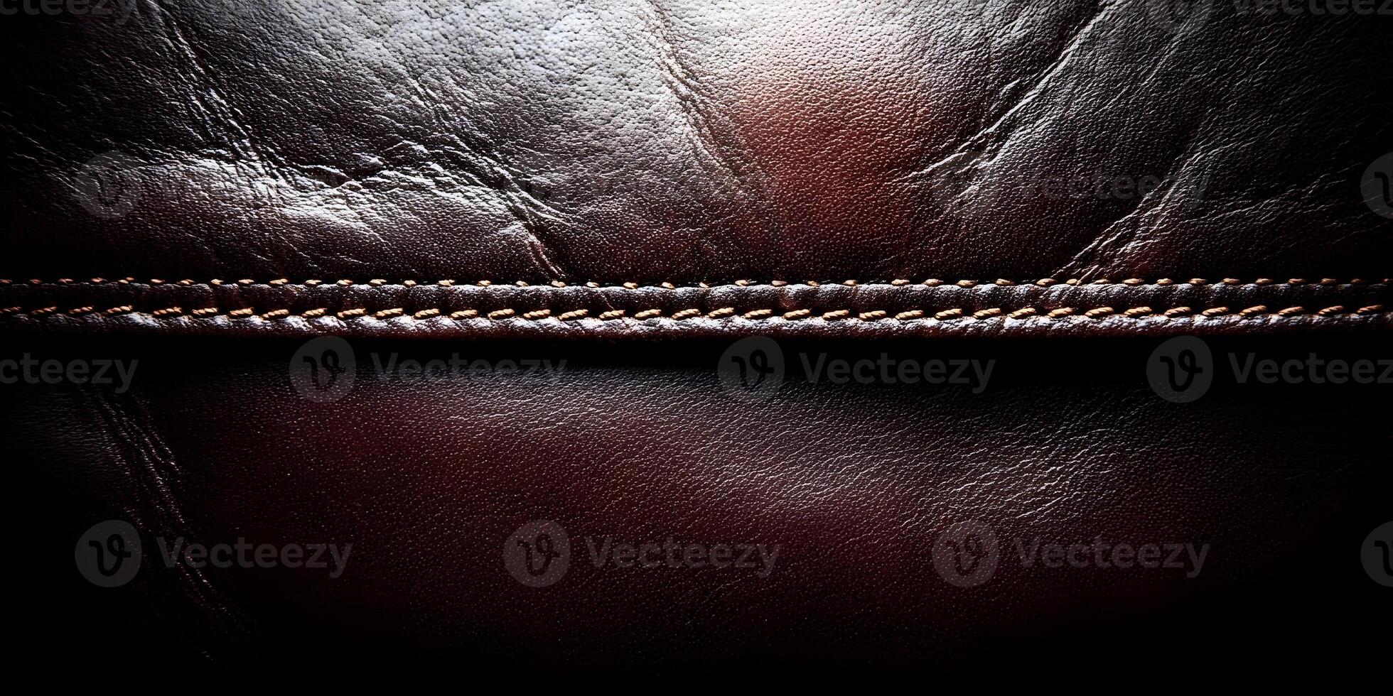 Dark Brown Leather Texture with Orange Stitching Detail Close Up photo