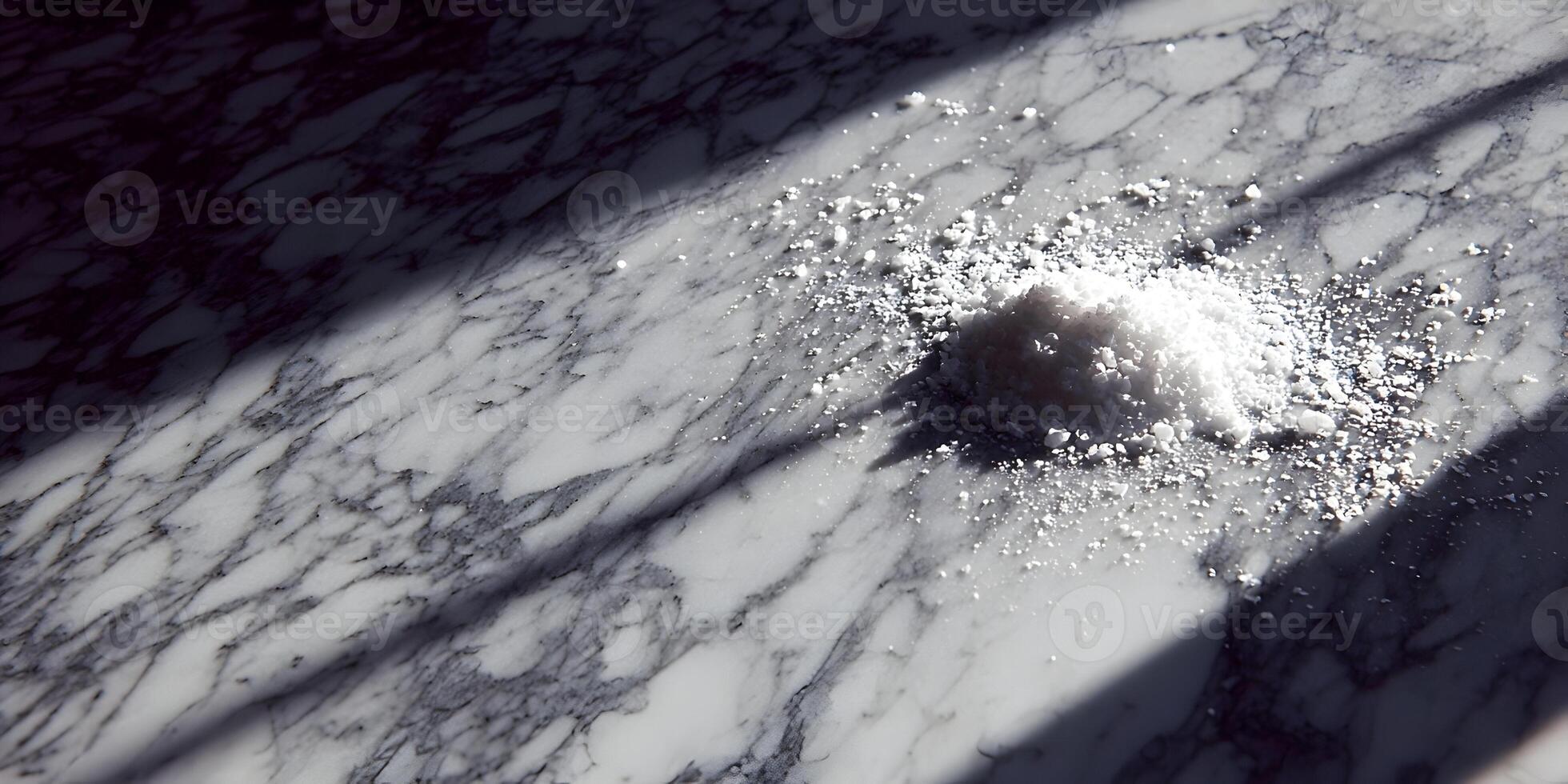 Pile of White Powder on Marble Surface with Shadows photo