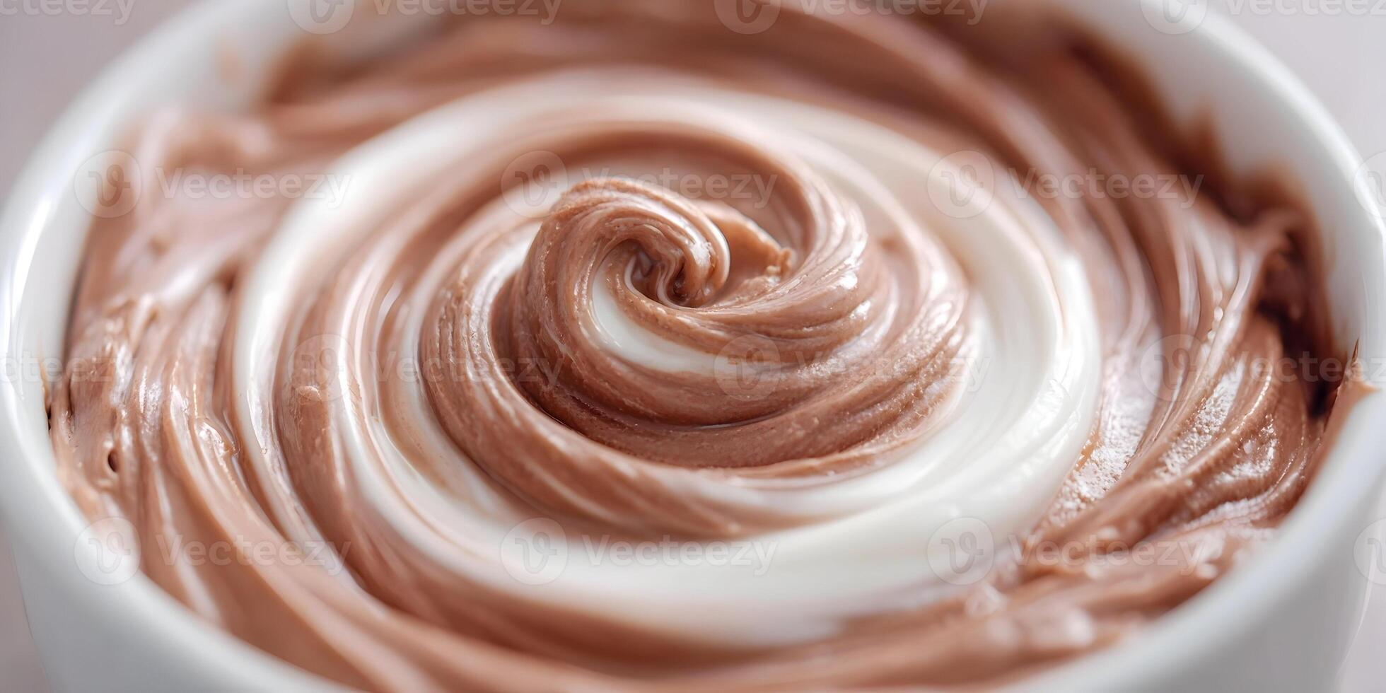 Closeup Swirled Chocolate Cream Dessert in Bowl photo