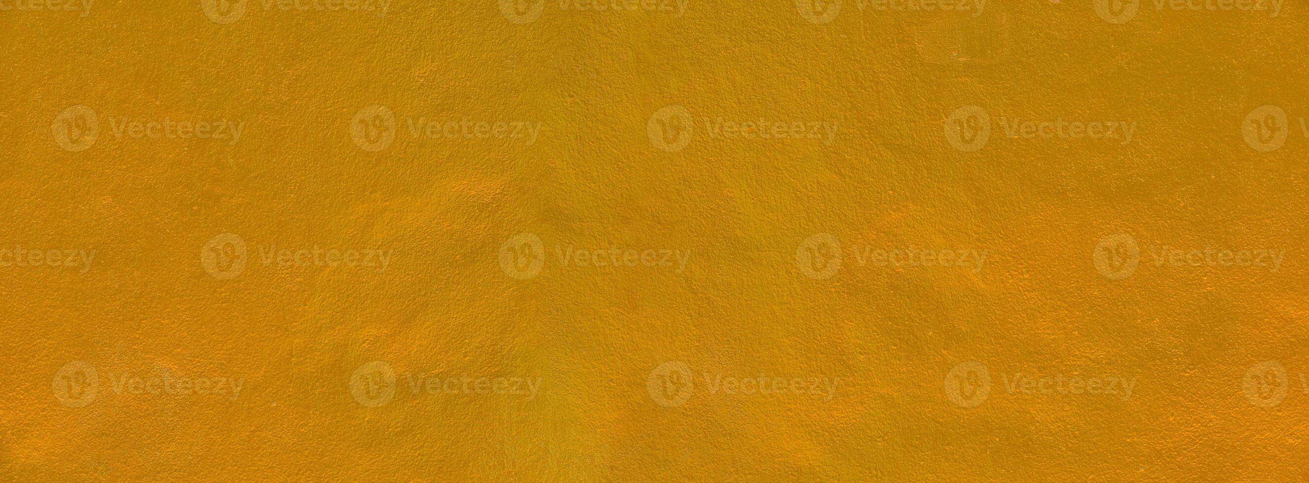Gold texture background. Concrete wall texture paint, gold color surface blank for design. photo