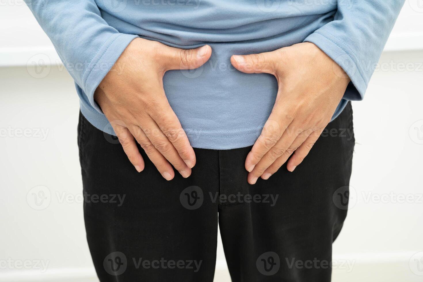 Hernia, man stomach ache, abdominal pain and urology problem health. photo