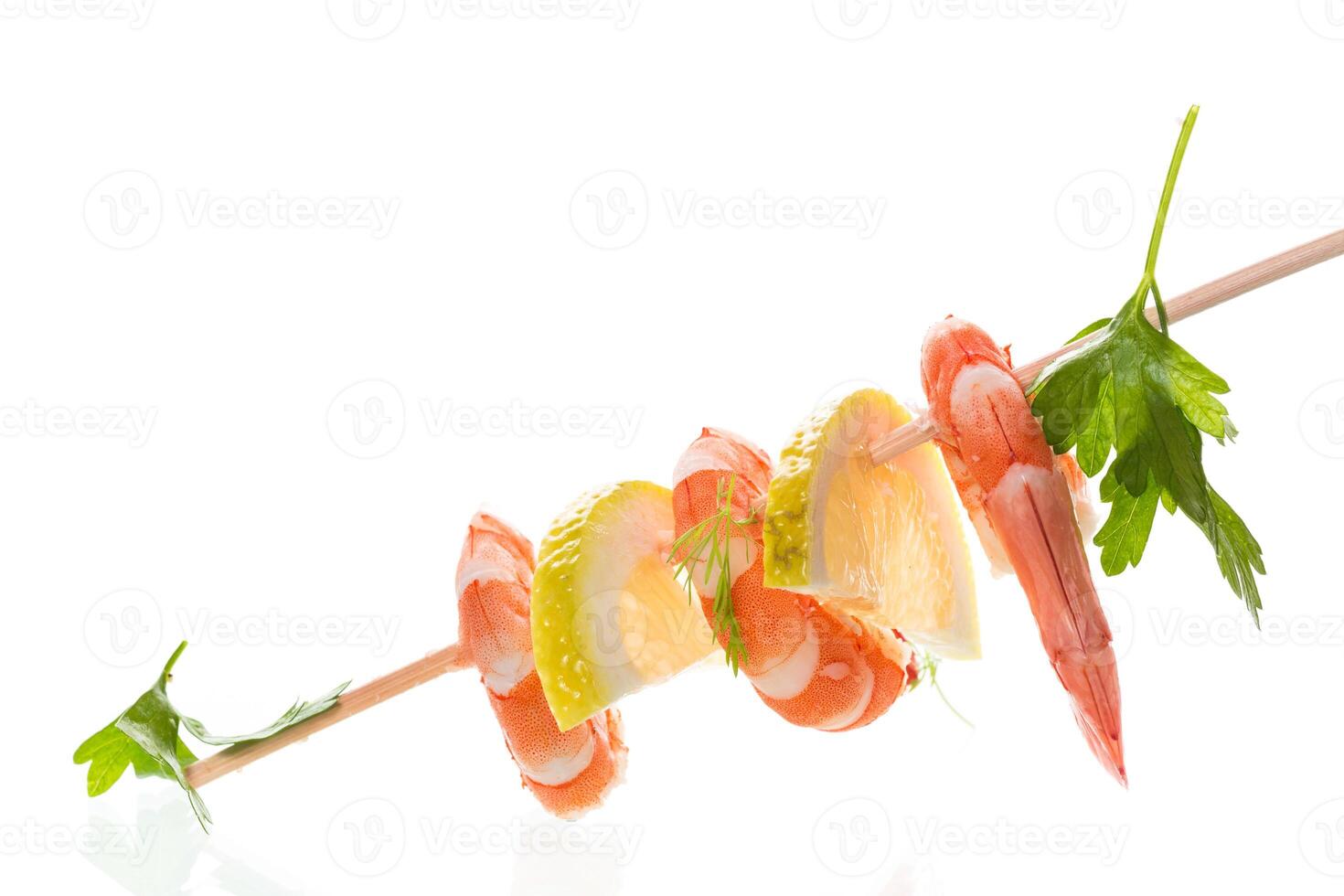 Ready to eat red shrimps with lemon isolated photo