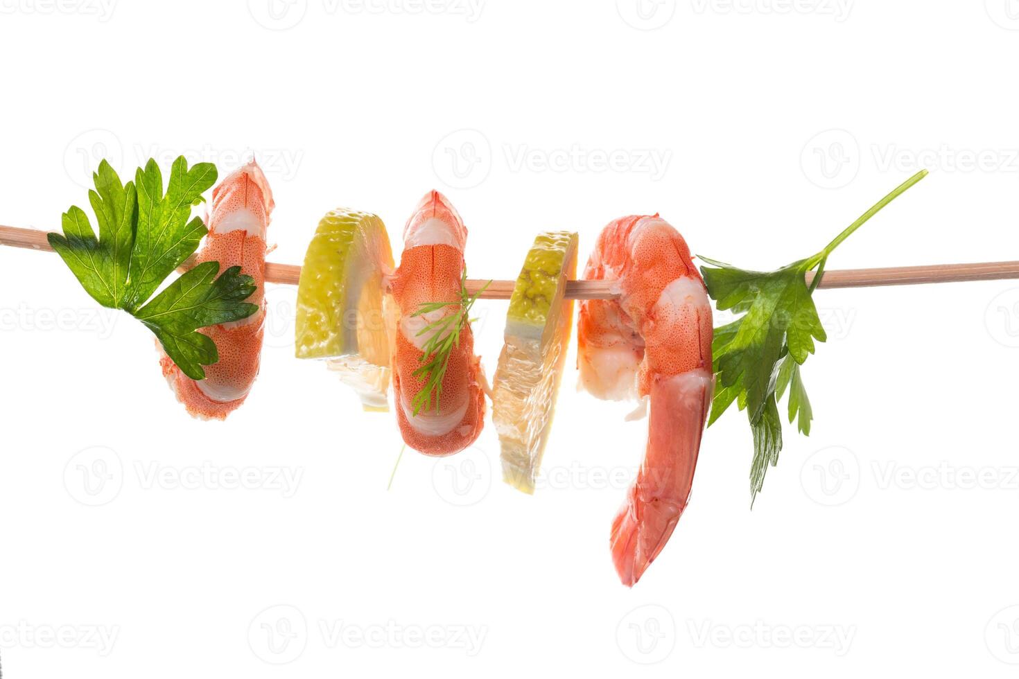 Still life of shrimps with lemon on white background photo