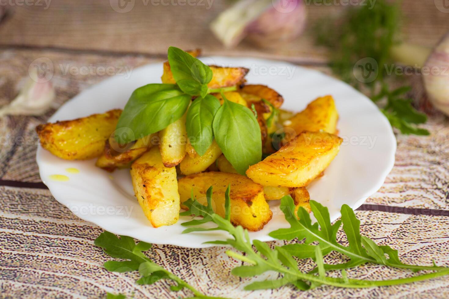 Delicious potatoes with a crispy crust for dinner . photo