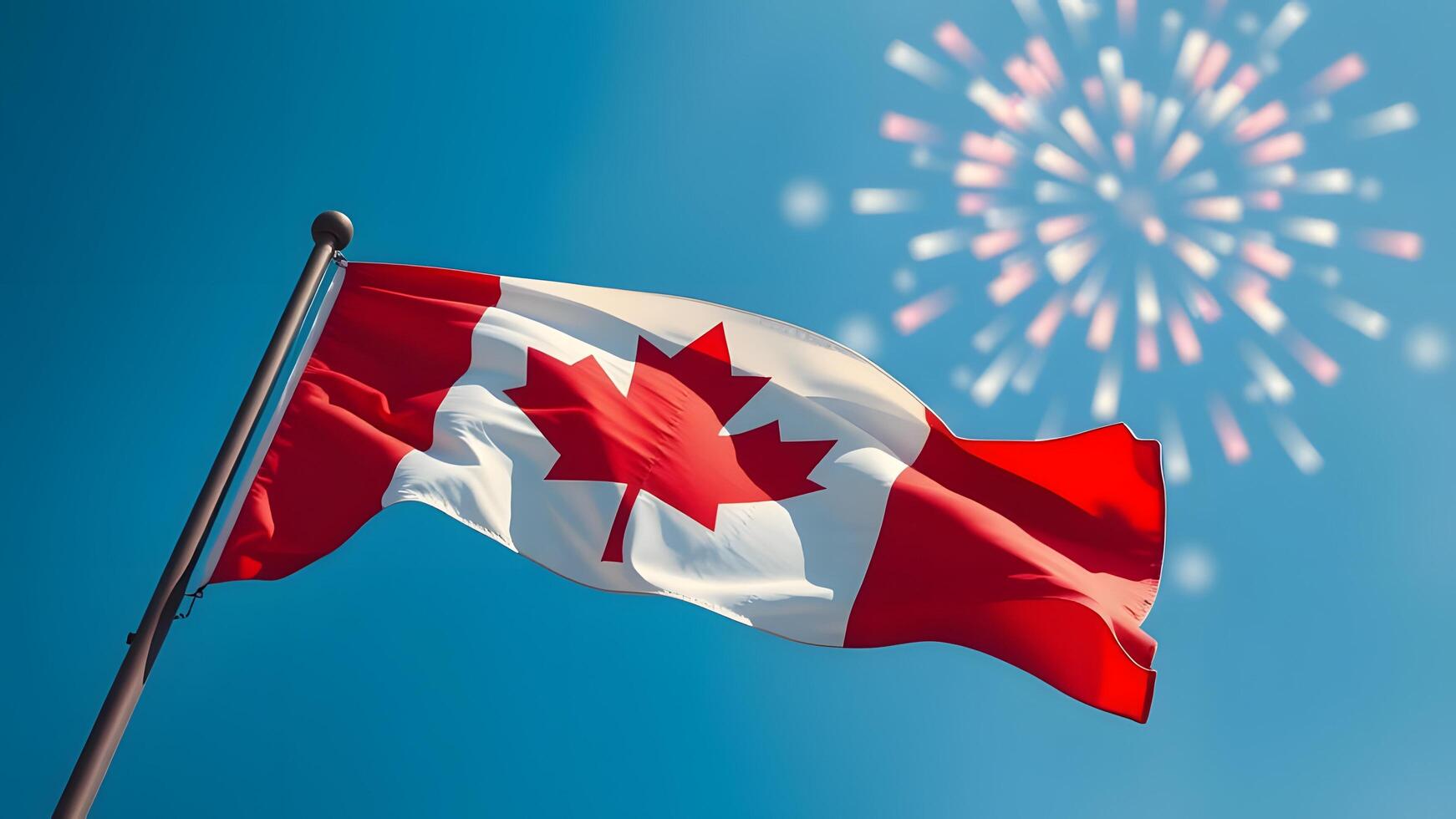 A vibrant flag waves against a clear blue sky with celebratory fireworks in the background. photo