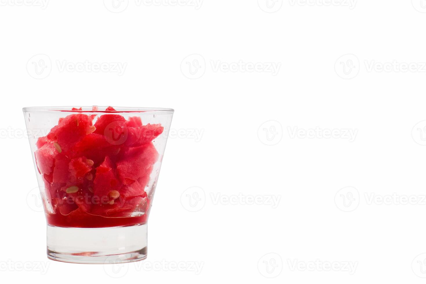 Refreshing watermelon sorbet in a clear glass served at a summer gathering on a warm afternoon photo