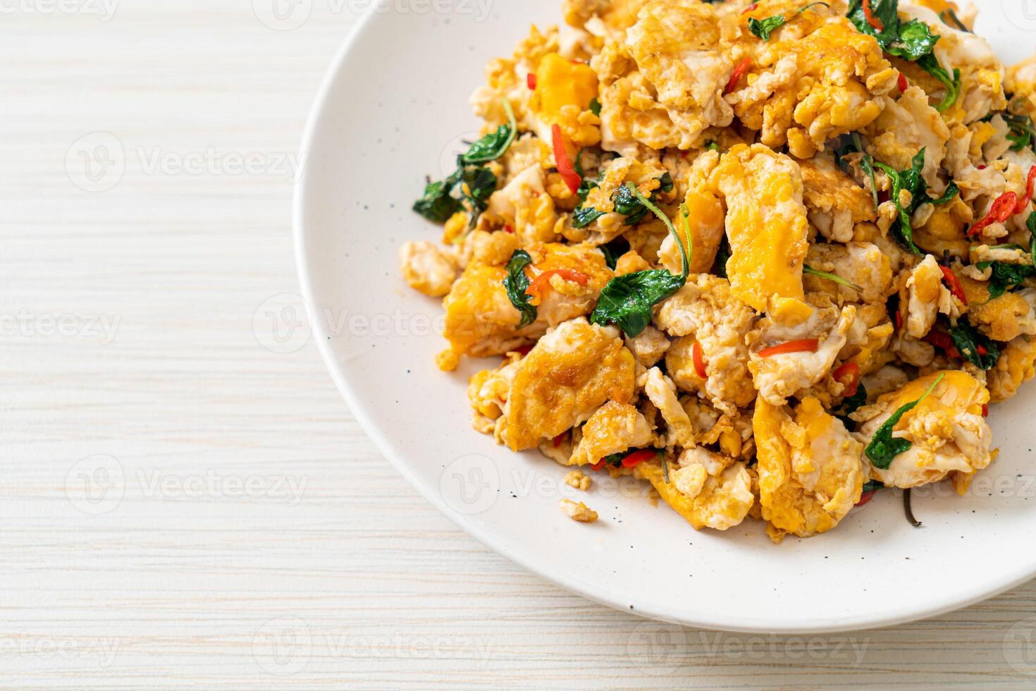 stir-fried egg with Thai basil and chilli - Thai food style photo