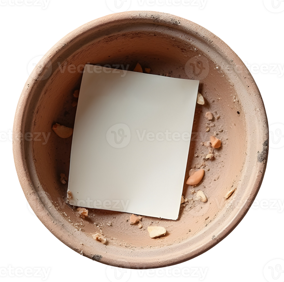 Aged terracotta pot holds blank paper, creating mysterious, solitary scene png