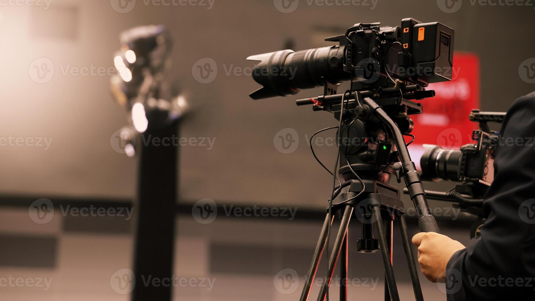 Professional cinema, cameras being used in a studio or event setting. photo
