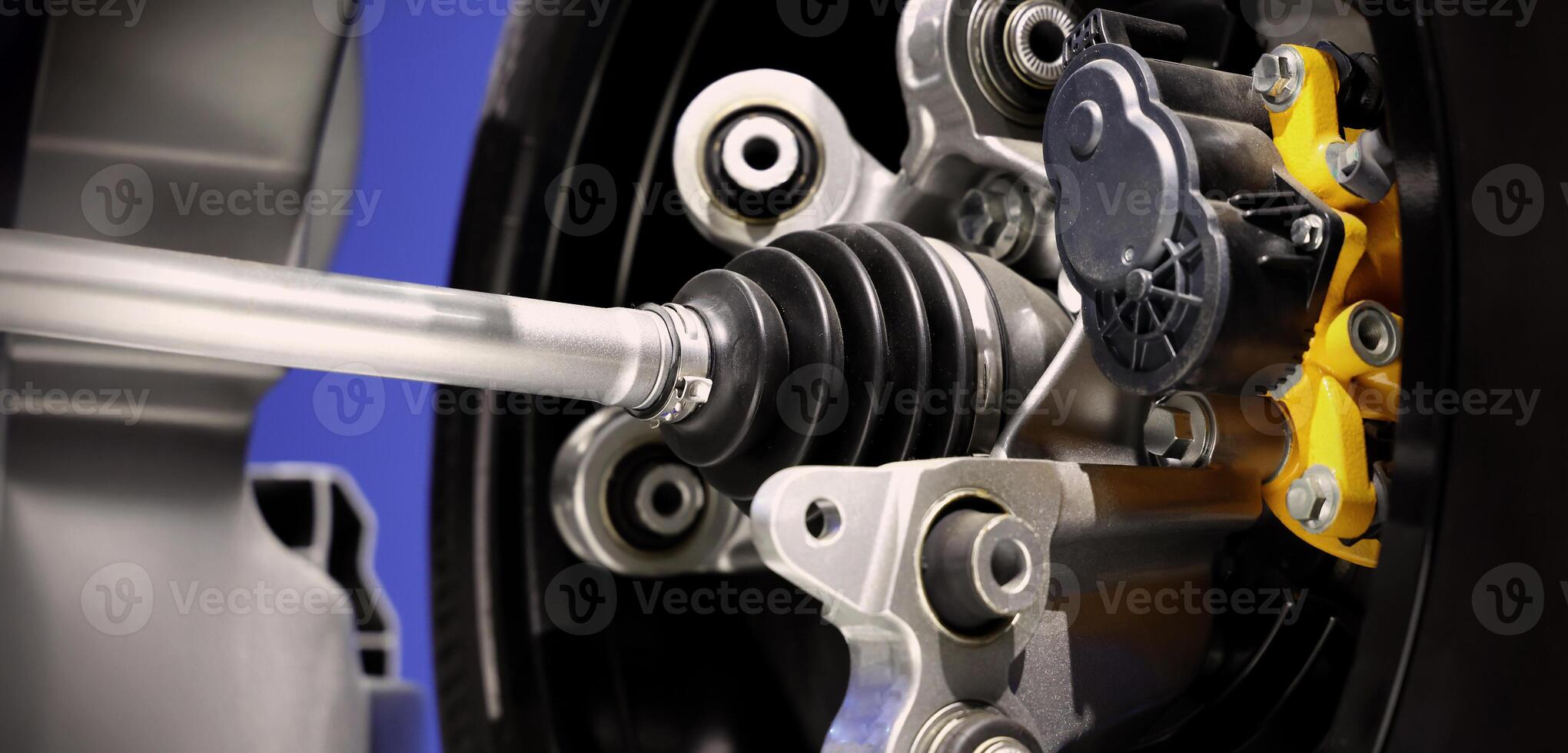 Close up, of a car suspension parts system such as CV joint Rubber boot and Control arms photo