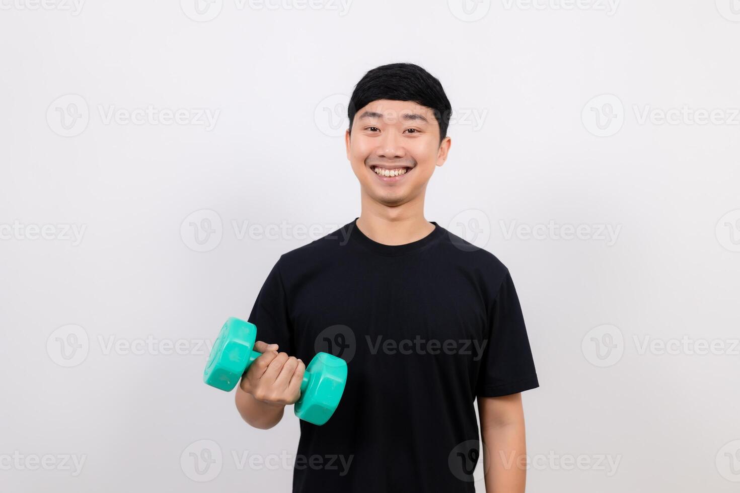 Asian man hold dumbbell for exercise happy smile isolated photo
